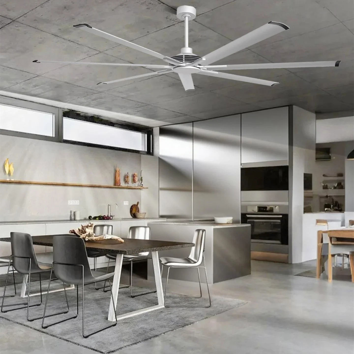 White ceiling fan with multi-blade design and downrod mount