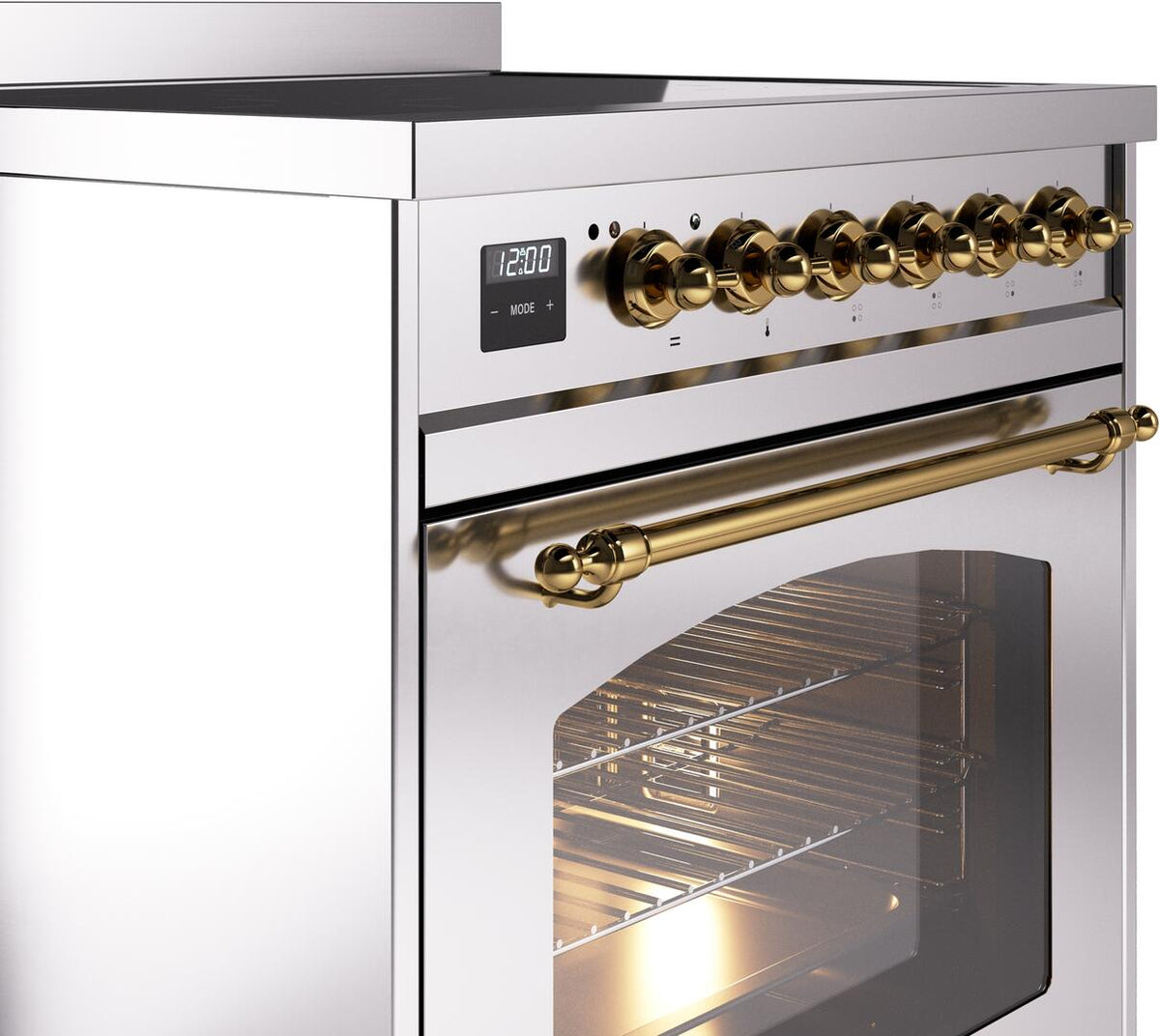 Stainless induction range control panel with brass knob row and oven door with glass