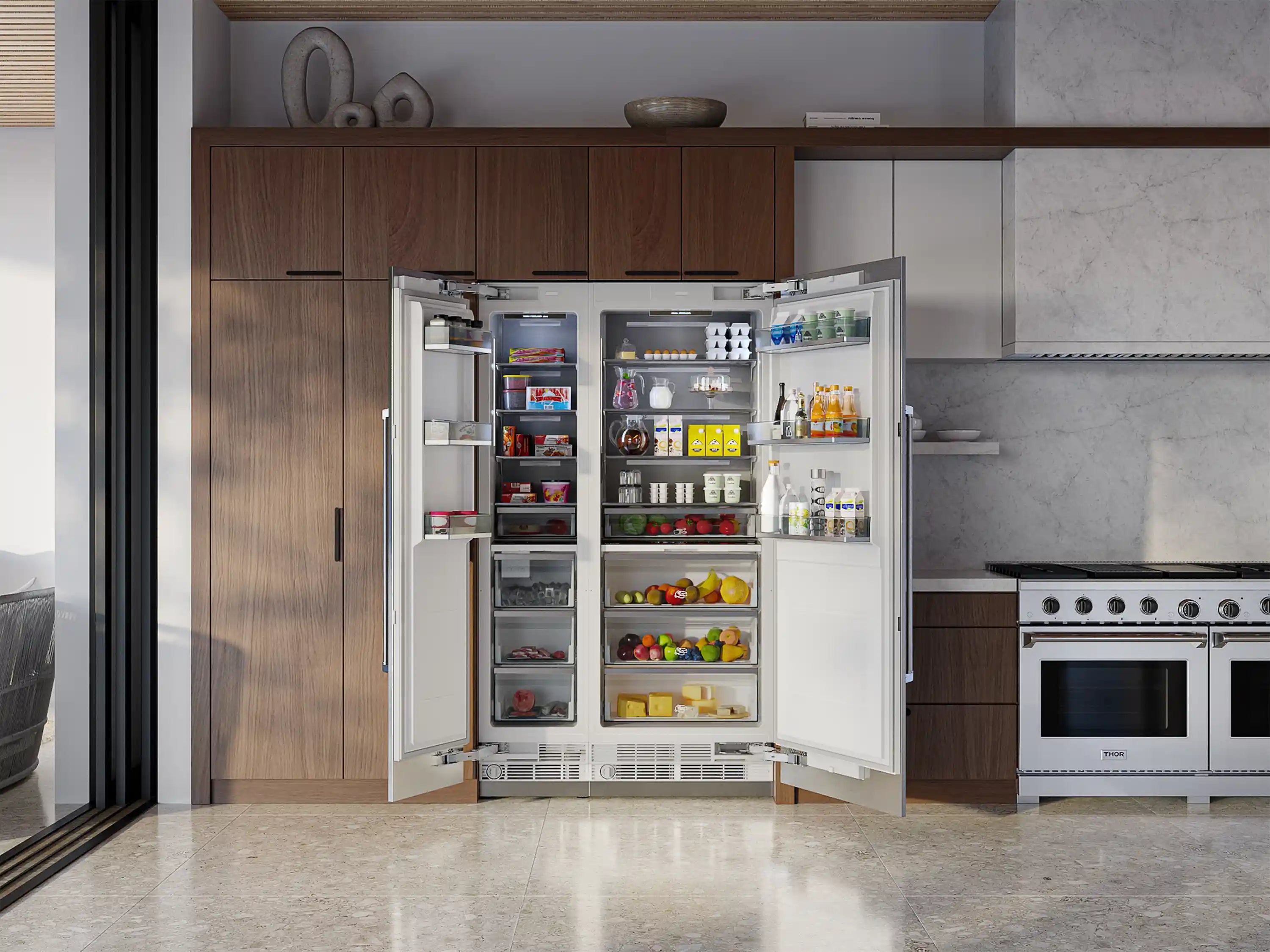 Built-in Thor Kitchen refrigerator-freezer column with doors open and stocked shelves.