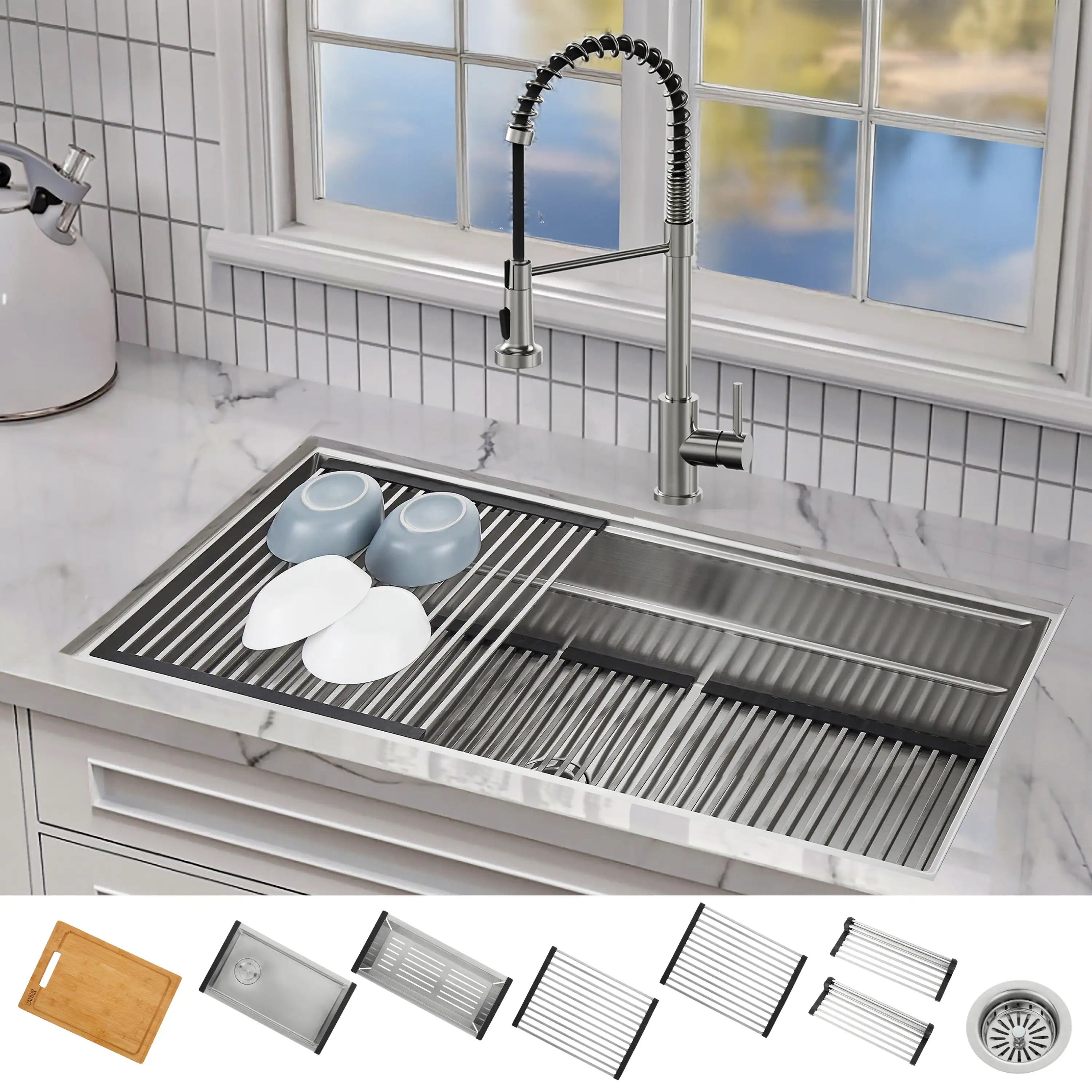 Stainless undermount sink with slotted drying rack holding plates and cups