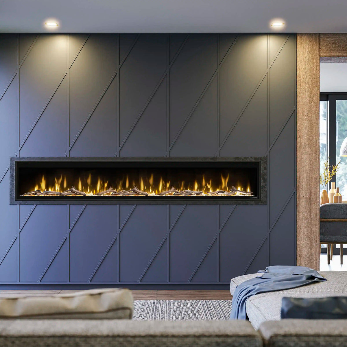 Built-in linear electric fireplace with black trim and yellow flame effect