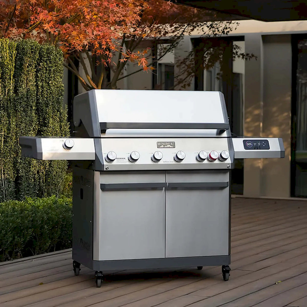 Stainless steel gas grill with 6 burners, side control panel, side shelf, wheeled cart