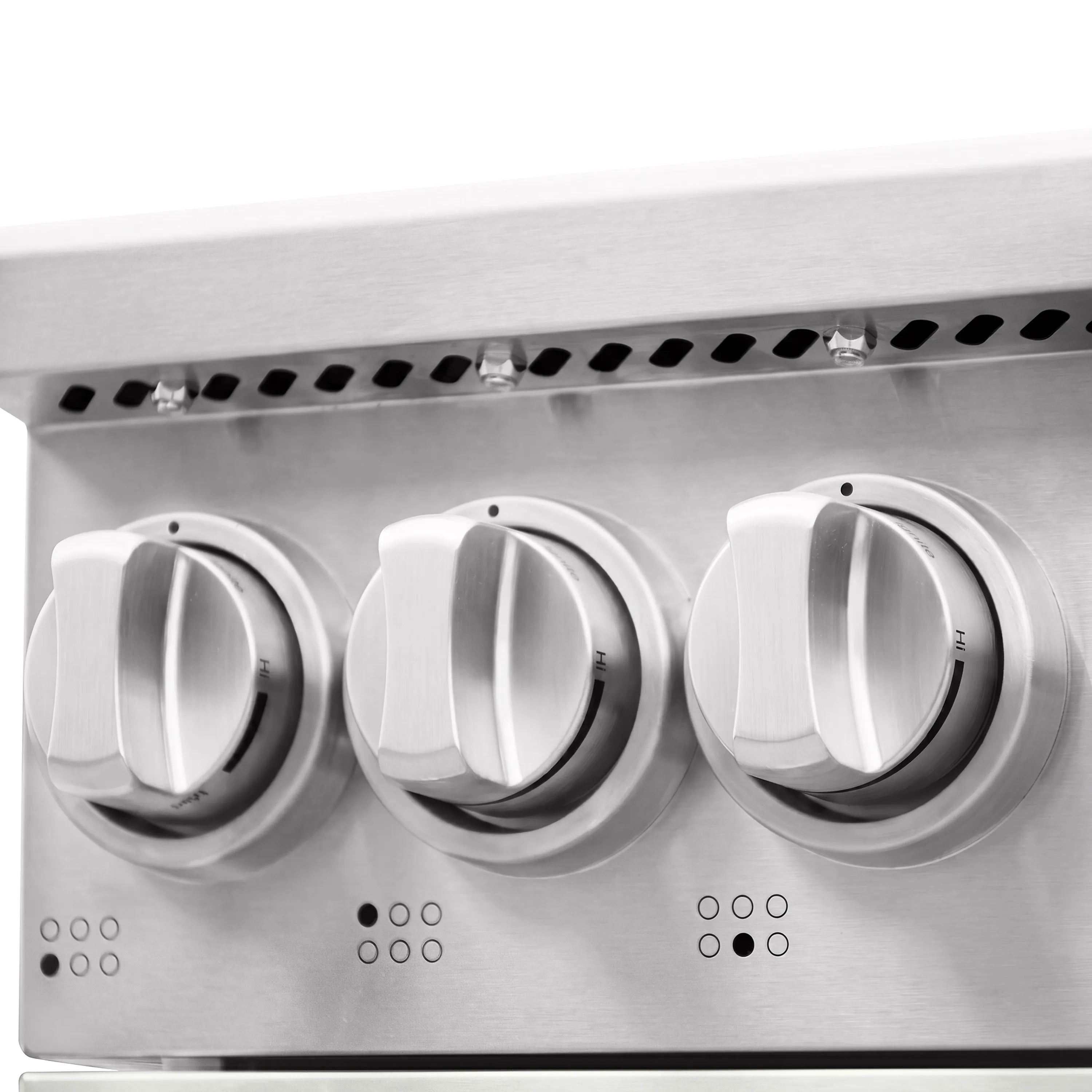 Gas range front control knobs with three large burner dials in white body