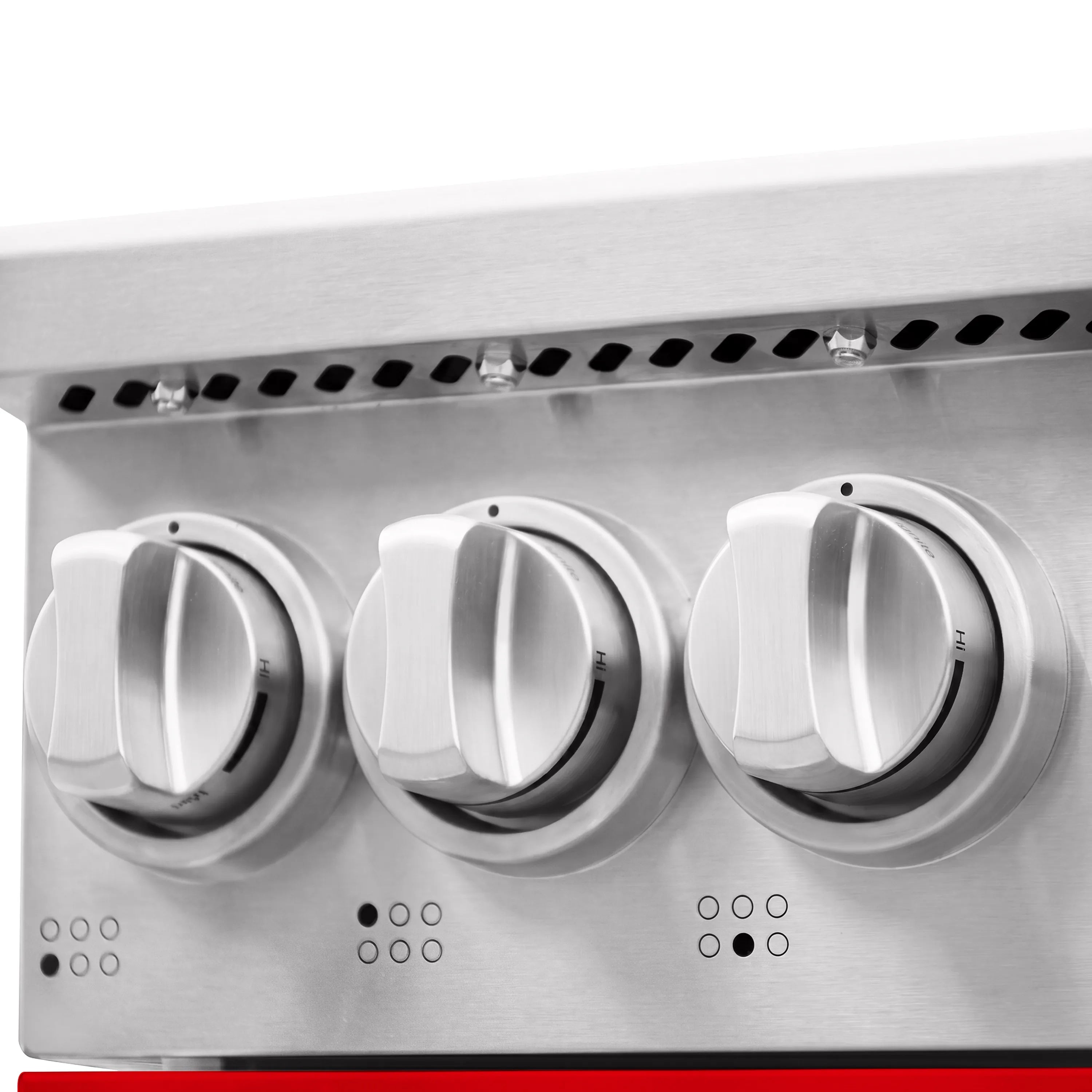 Stainless steel control knobs panel with three large gas burner knobs