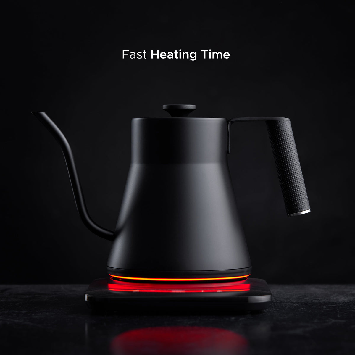 Matte black gooseneck electric kettle with arched spout and red heating ring