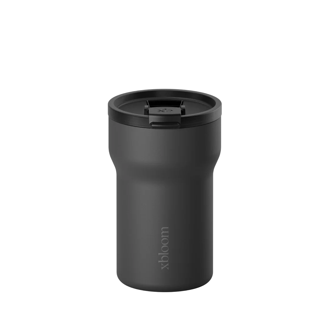 Charcoal black passenger tumbler with flip-top lid and drinking opening