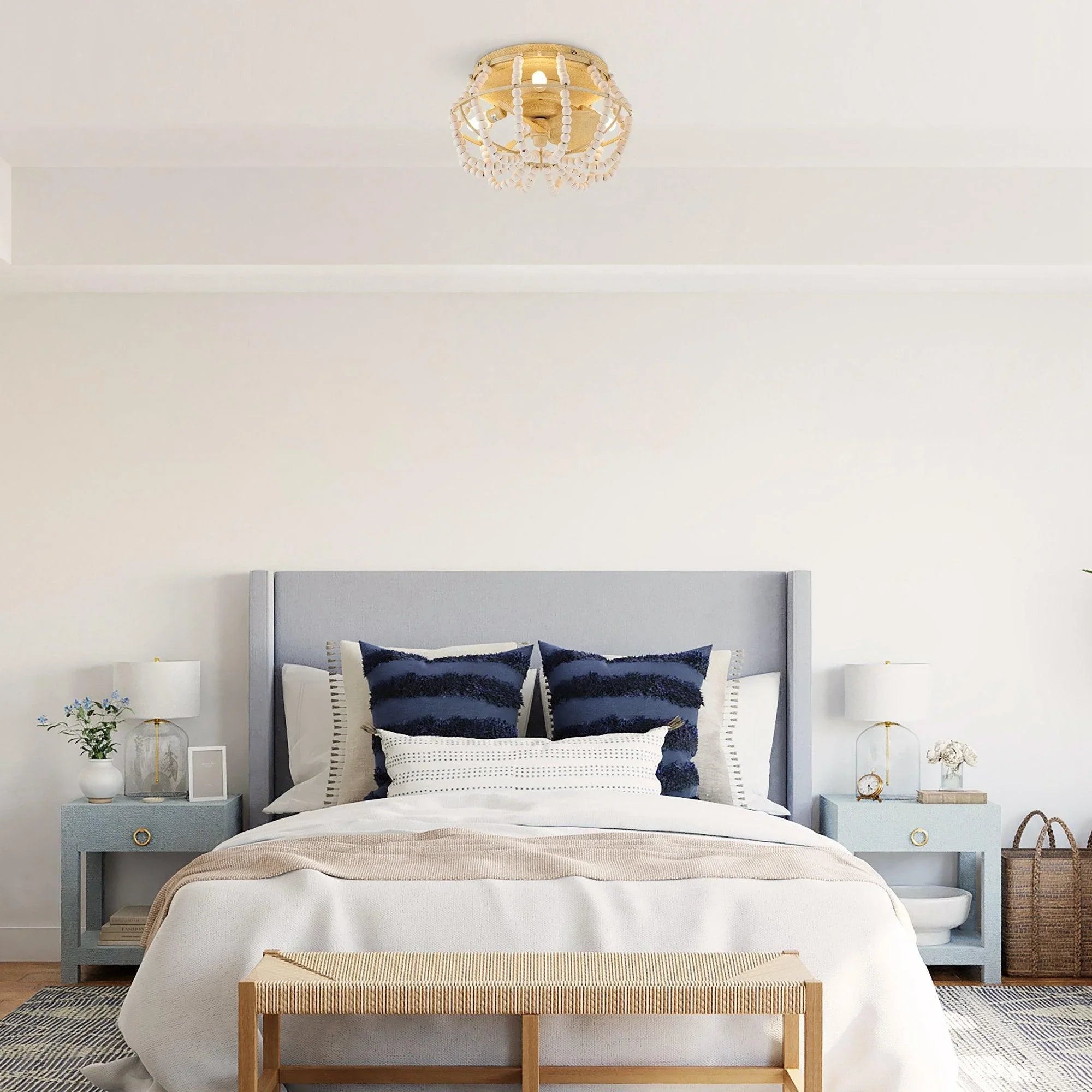 Beige flush-mount ceiling fan light with beaded fringe, mounted on white ceiling