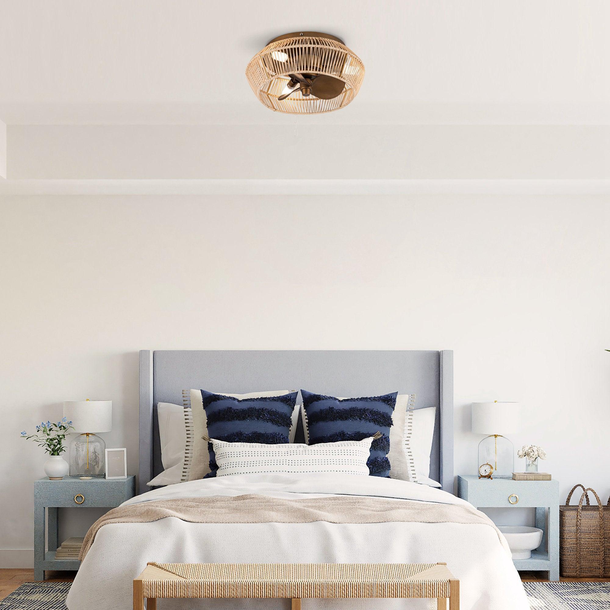 Golden flush-mount ceiling fan with rattan-style cage and three dark blades