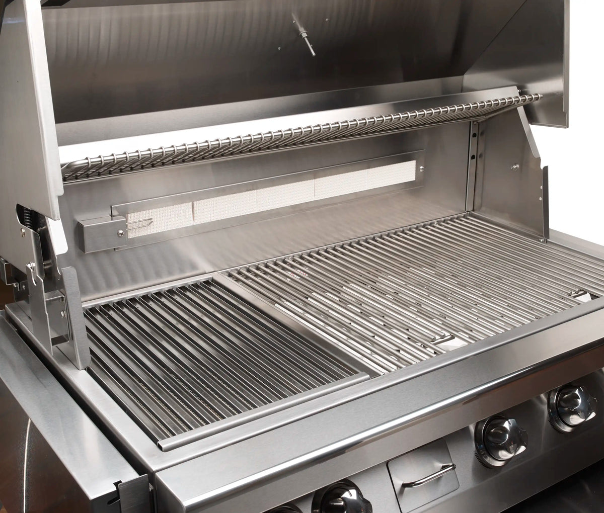 Stainless steel natural gas grill with open lid and cooking grates, built-in design