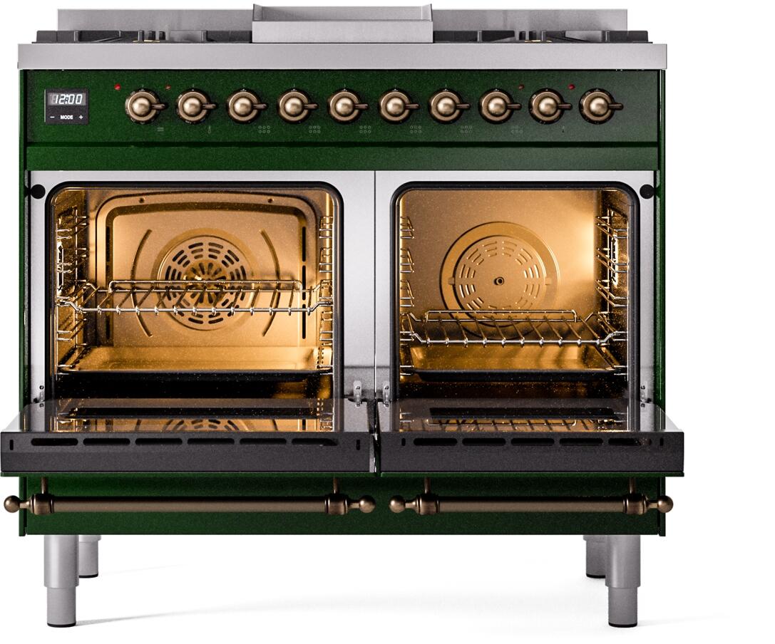 Emerald green dual fuel freestanding range with open ovens, racks, and bronze trim
