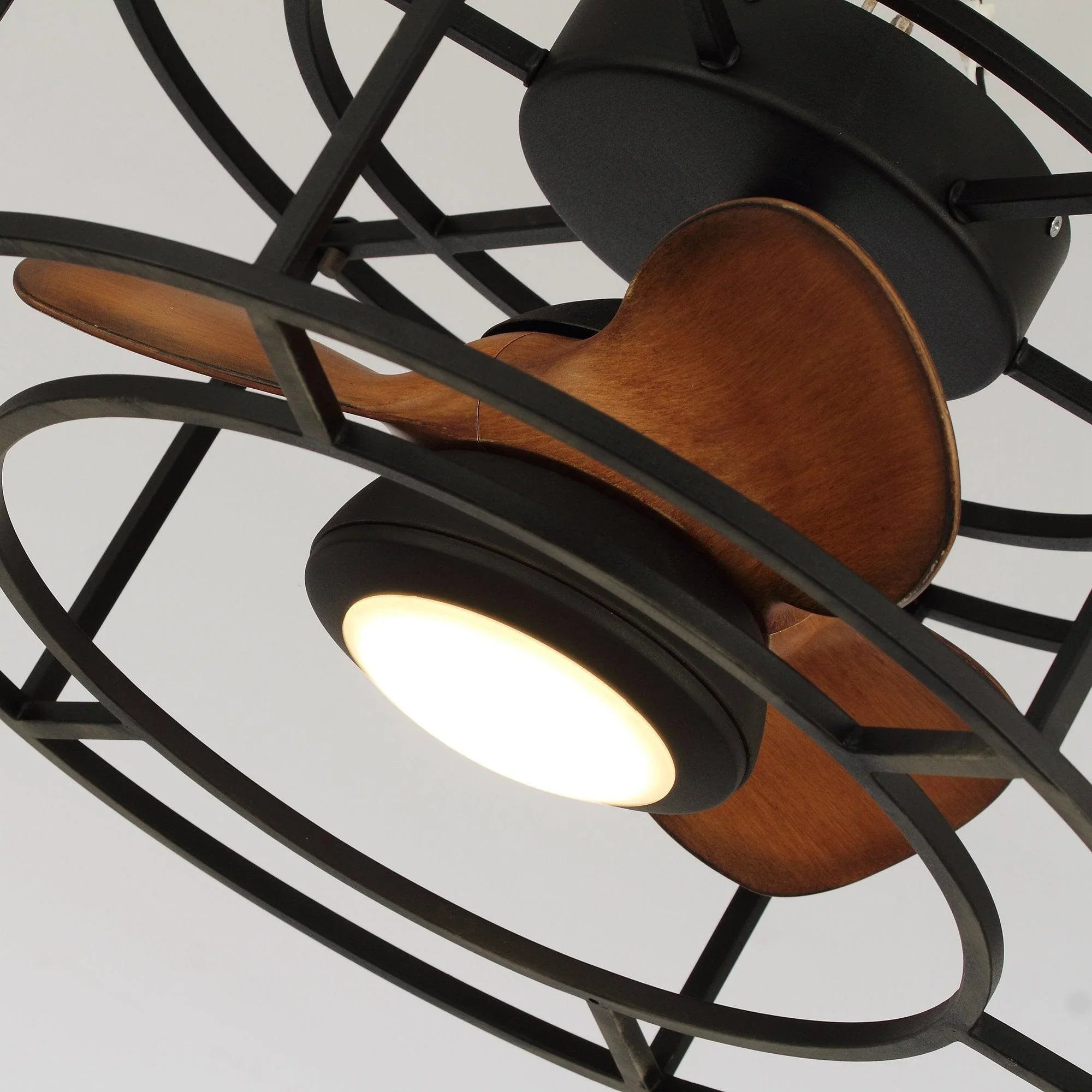 Black ceiling fan with brown blades and an integrated LED light glow