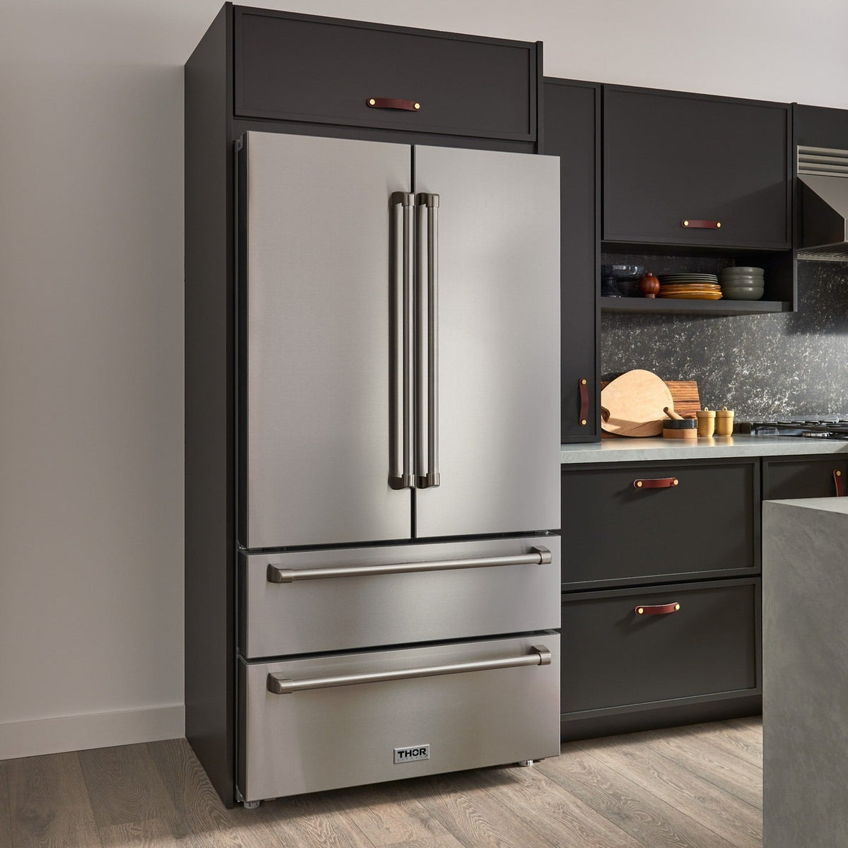 Stainless steel French door refrigerator with side-by-side door handles