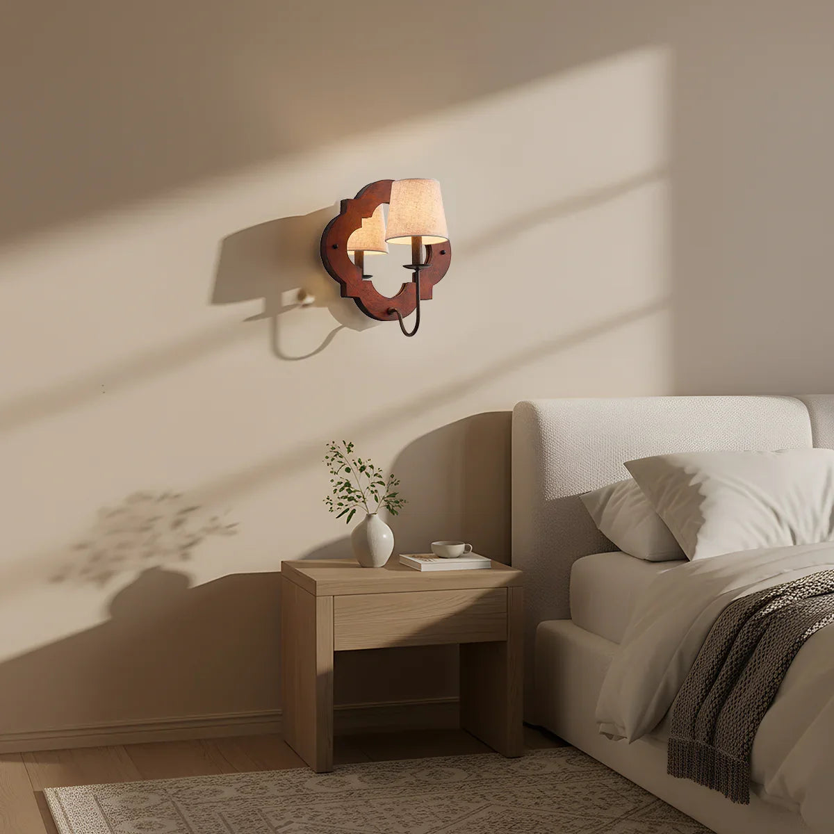 Rustic brown 1-light wall sconce with fabric drum shade on indoor wall