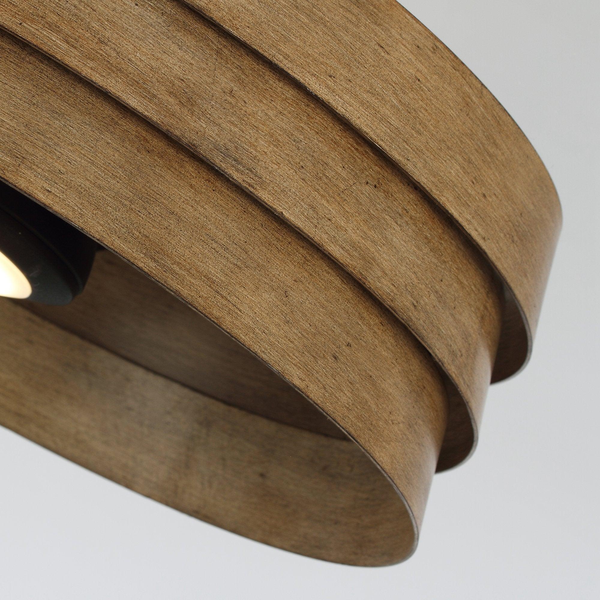 Side view of brown flush mount LED ceiling fan showing layered wood-look drum slats