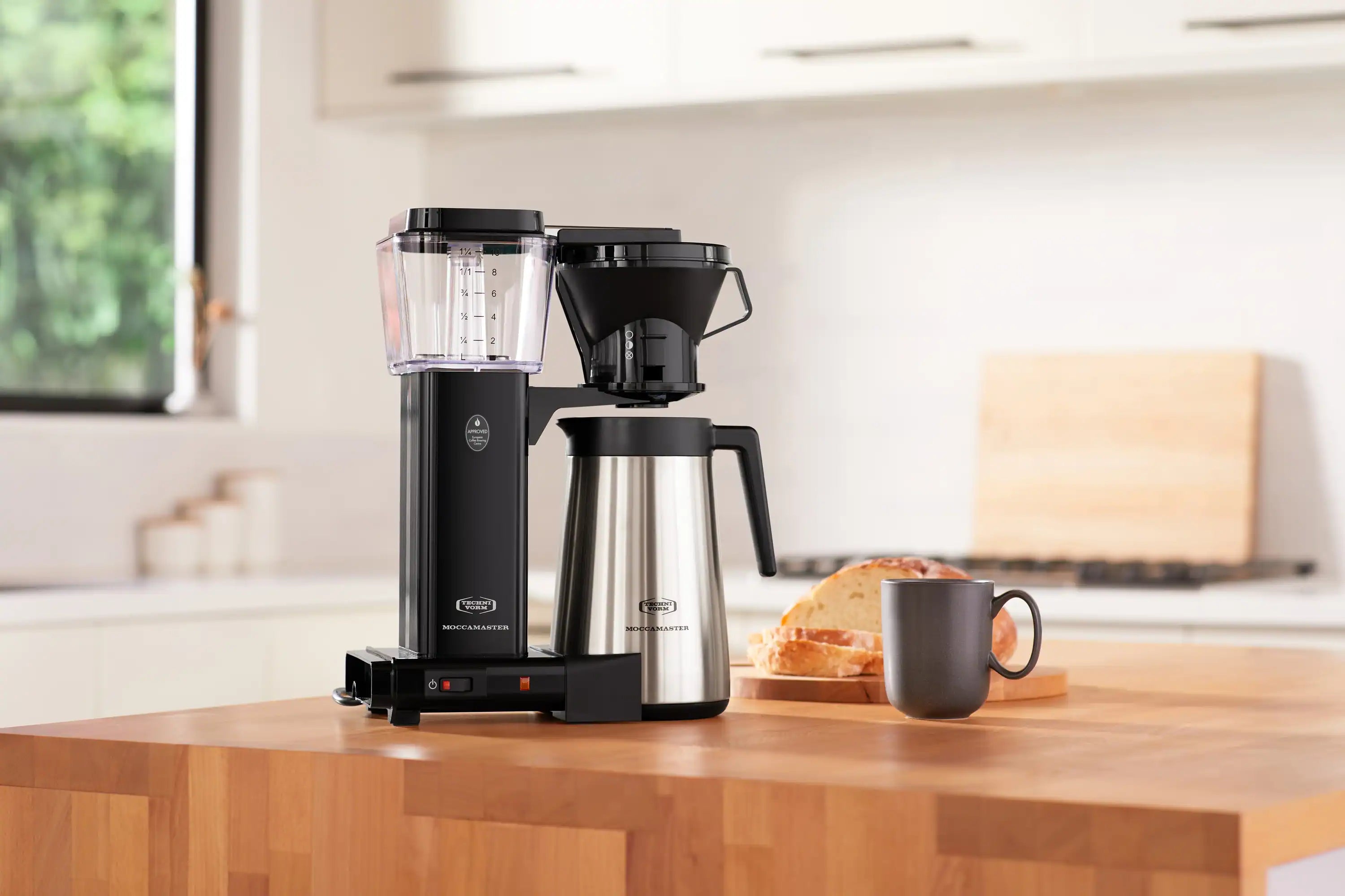 Black 10-cup drip coffee maker with stainless thermal carafe and side handle