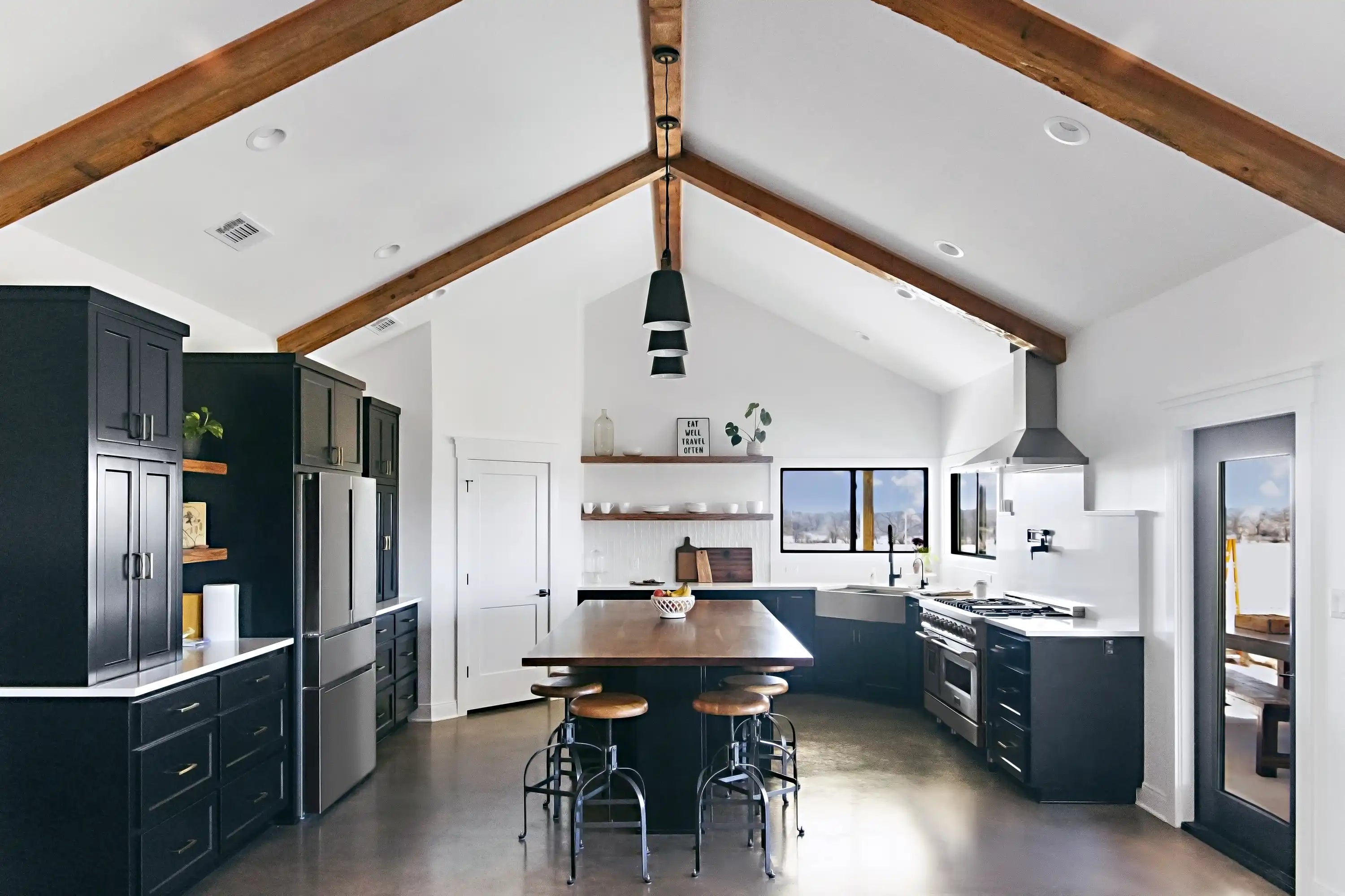 Stainless steel corner range hood with chimney and integrated fan vents