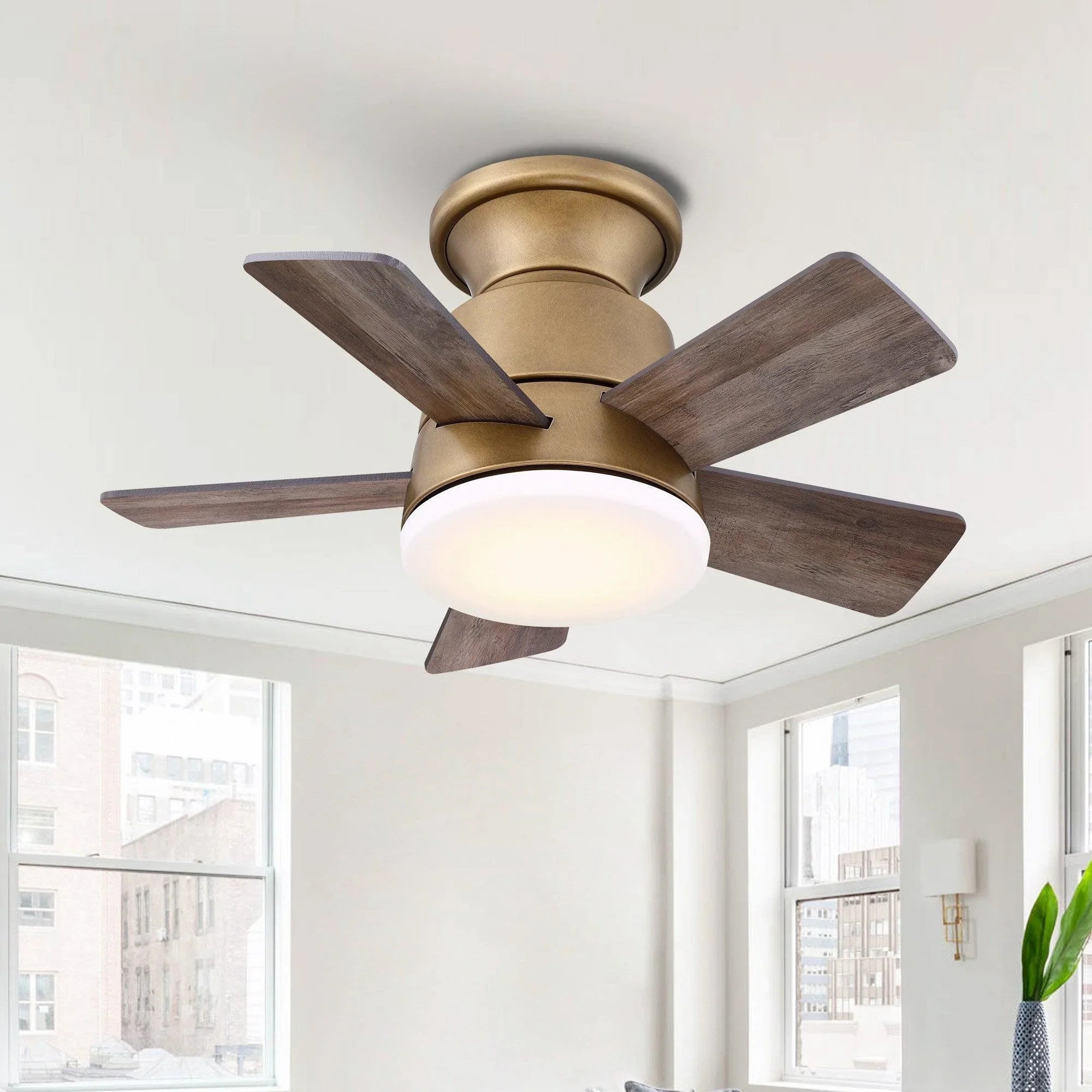24-inch farmhouse flush mount ceiling fan with reversible wood-look blades and light, brushed brass