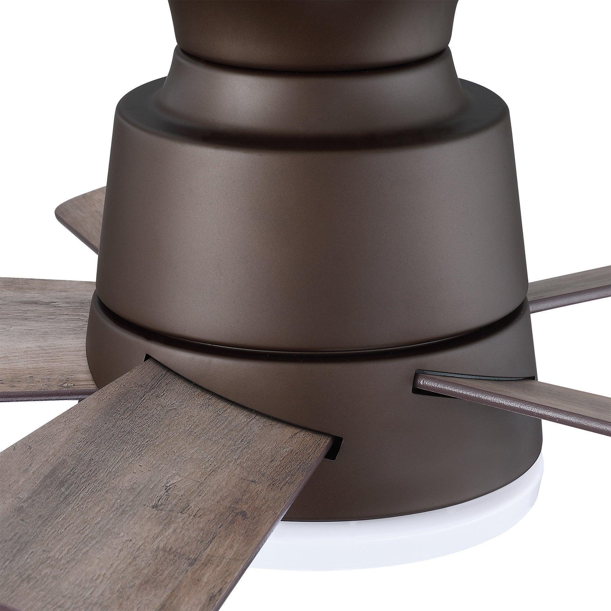 Dark bronze flush-mount ceiling fan close-up with wood blades and frosted light