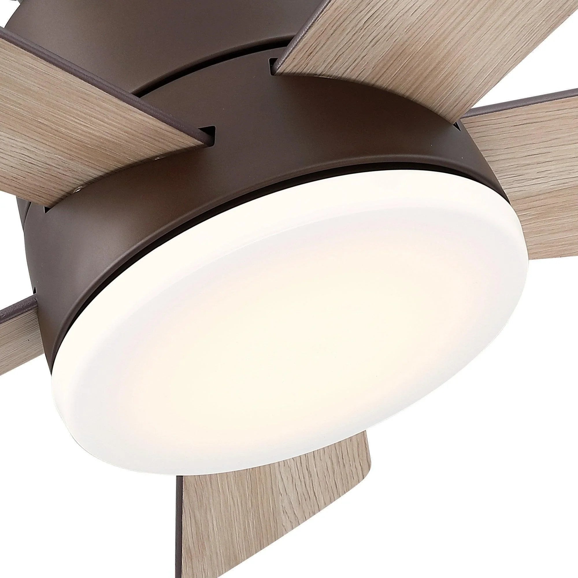 Close-up of oil-rubbed bronze flush-mount ceiling fan light dome with wood blades