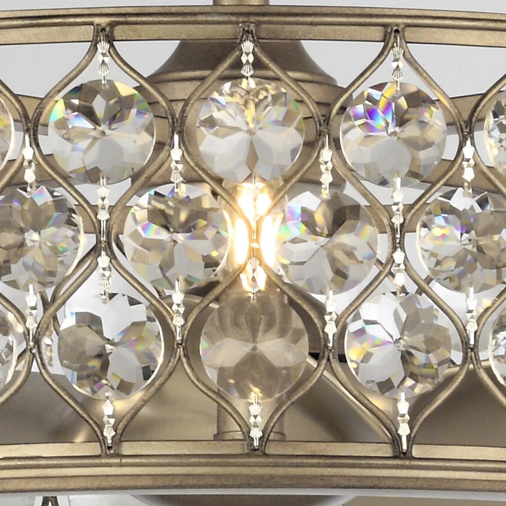 Gold crystal ceiling fan chandelier with faceted droplets and warm center light