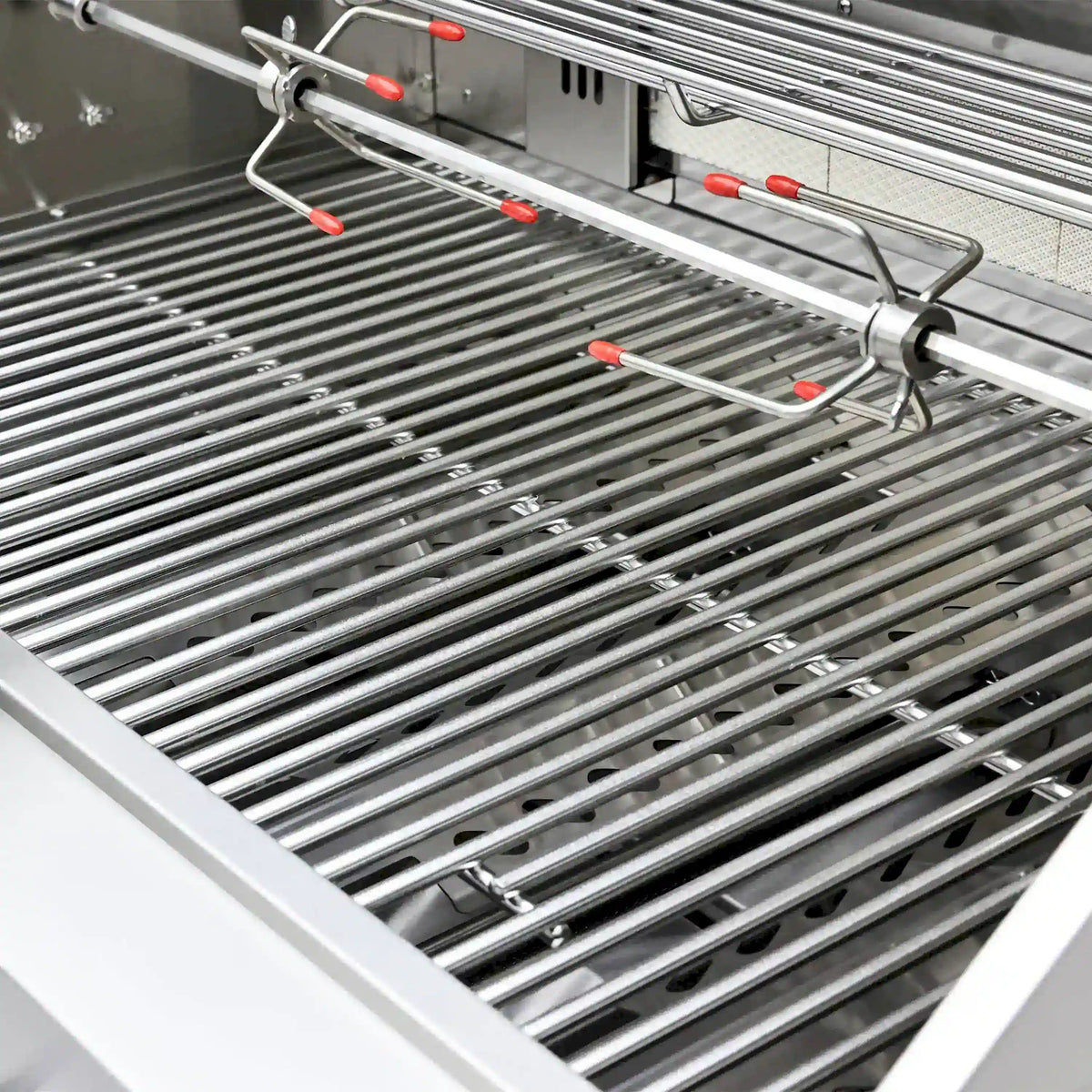 Close-up of stainless grill grates with cooking bars and support rails