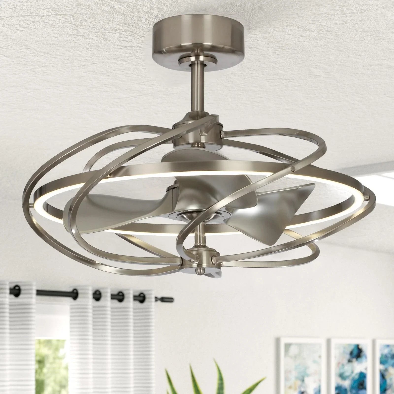 Brushed nickel ceiling fan with swirl blade ring and flush-mount canopy