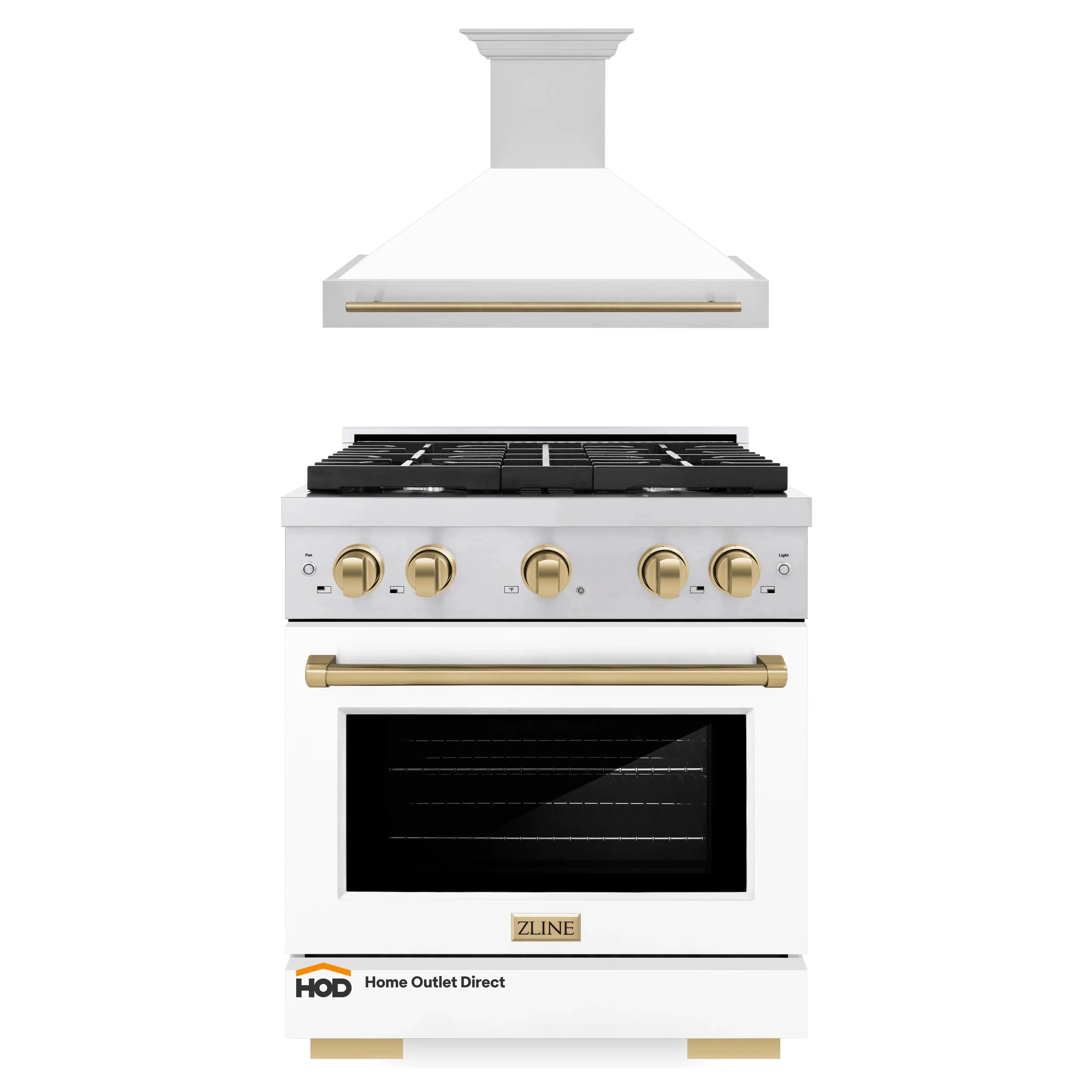 Stainless and white gas range with matching wall hood and brass trim