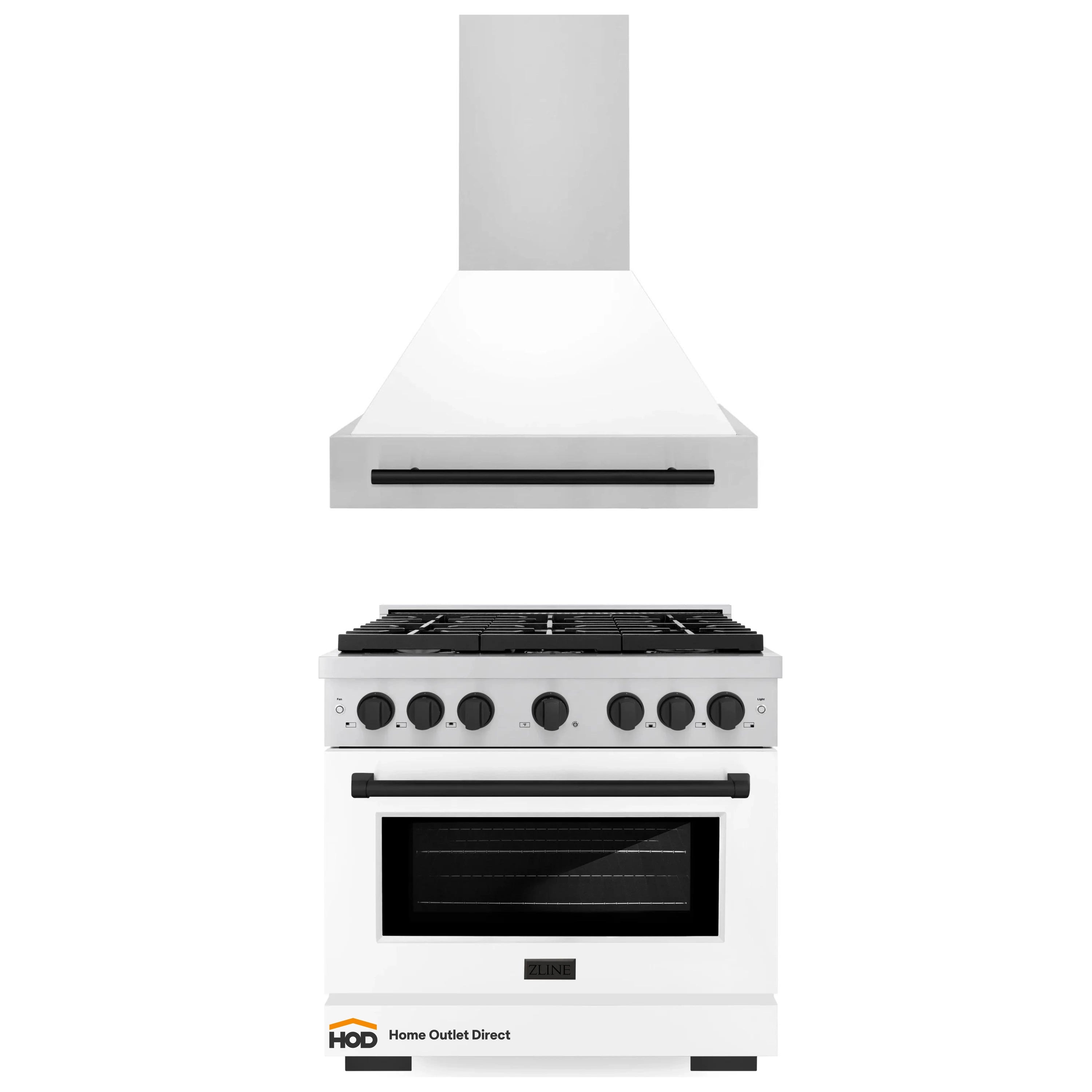 White range hood and gas range with black knobs and oven door, stainless trim