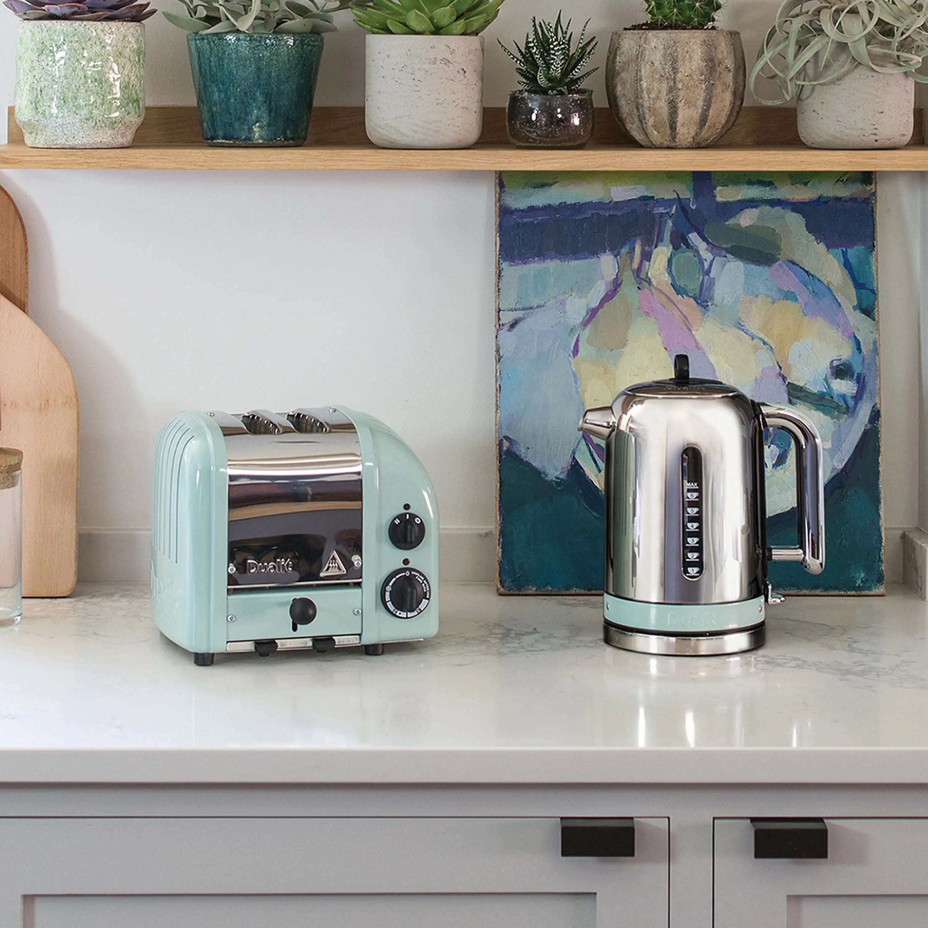 Eucalyptus Dualit 2-slice toaster on kitchen counter with two front controls