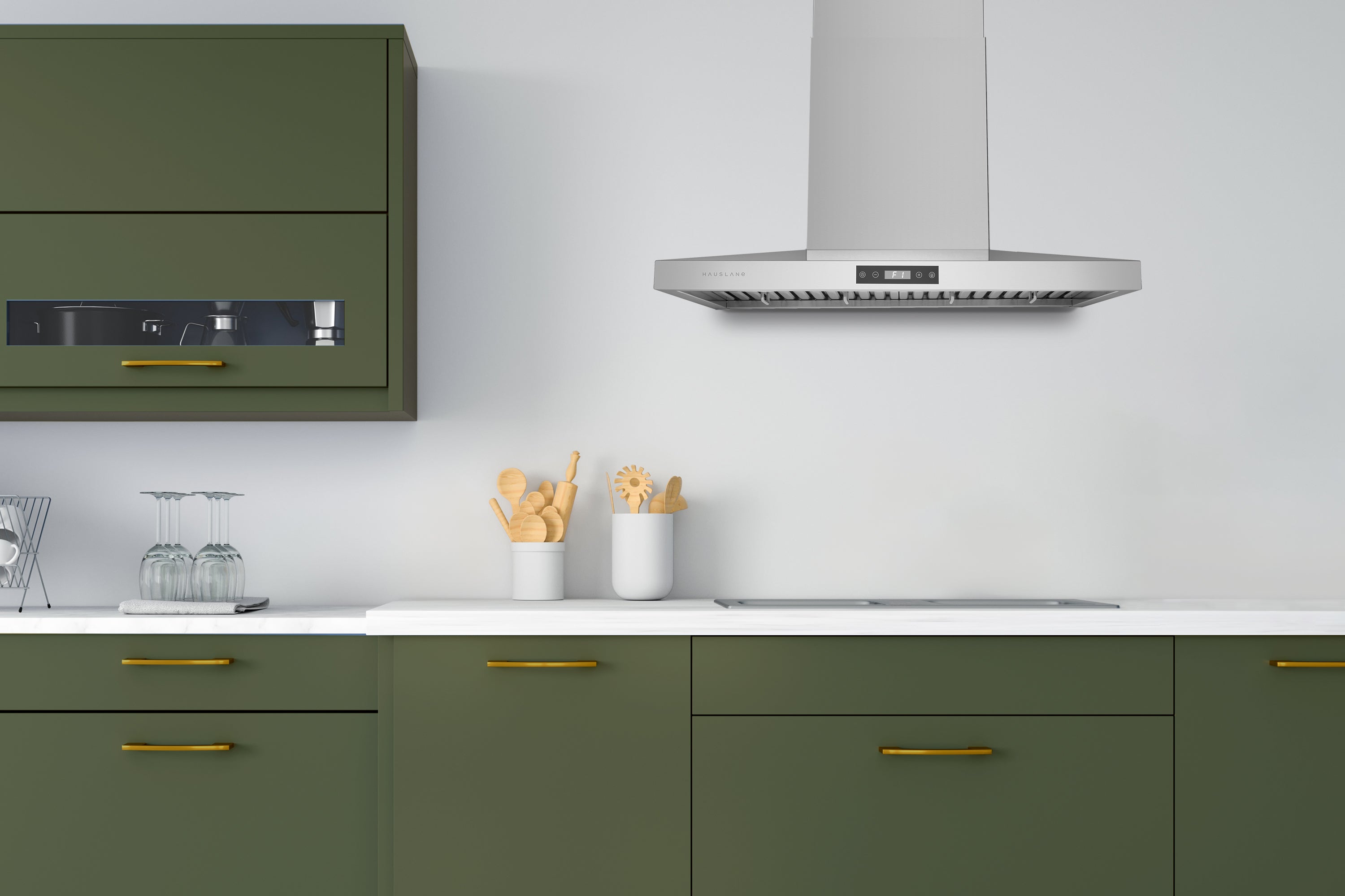 Stainless steel wall mount range hood above cooktop with rectangular chimney