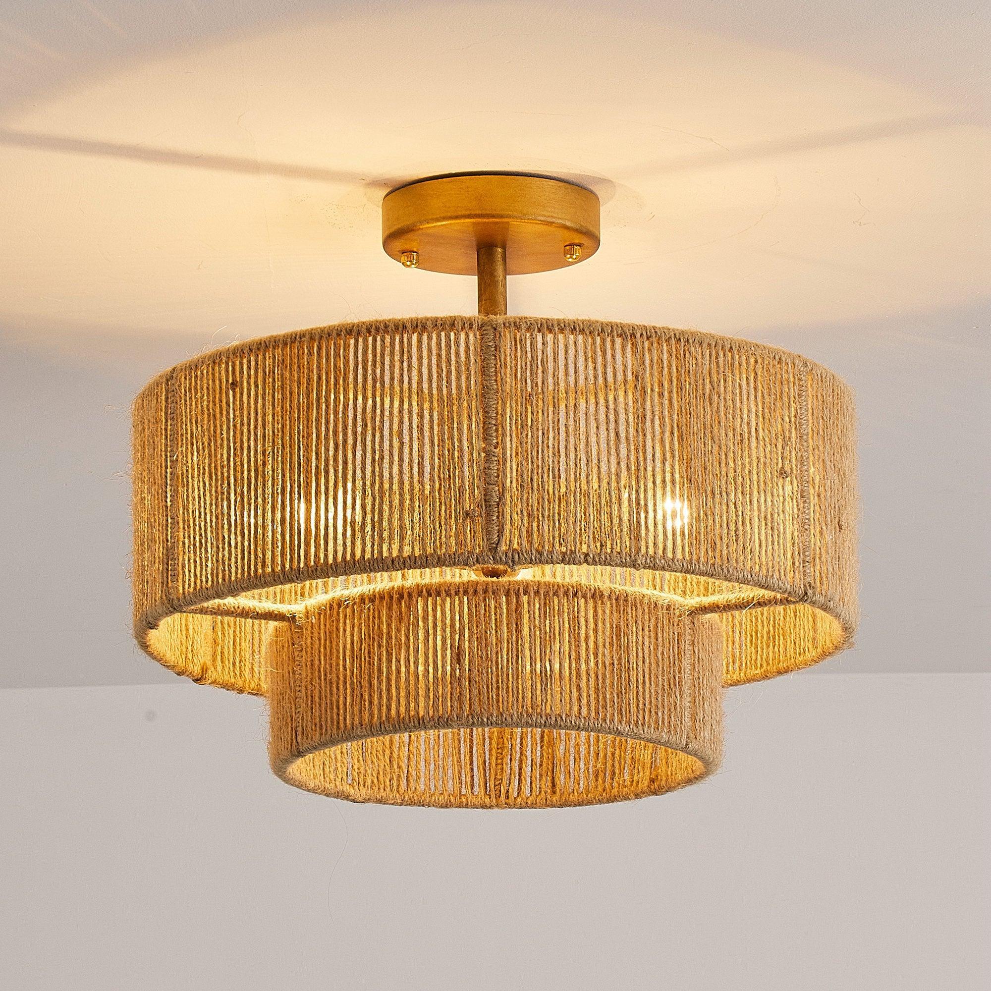 Golden woven drum flush mount ceiling light with three-tier shade look.
