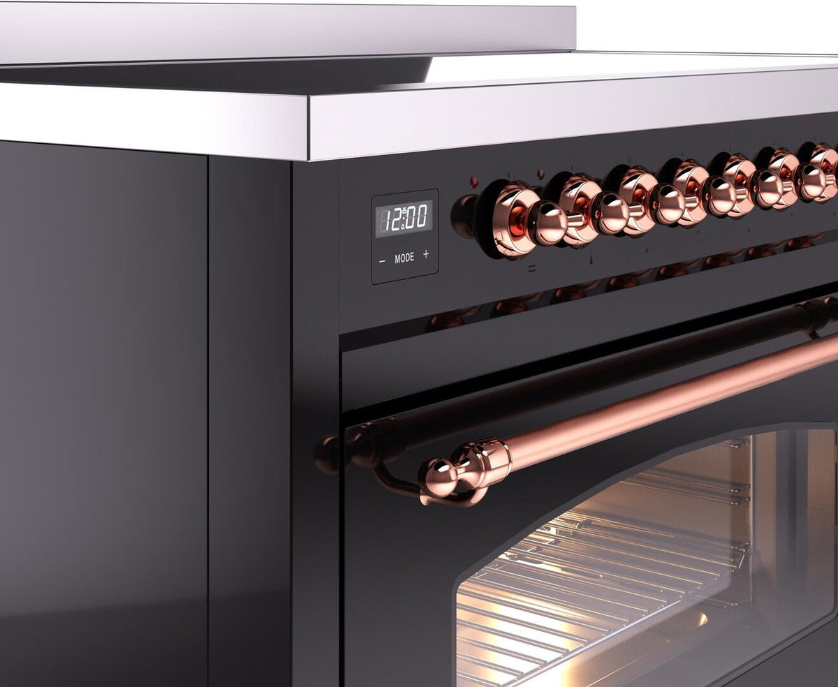 Induction range control panel with copper knobs, digital display, and illuminated oven handle