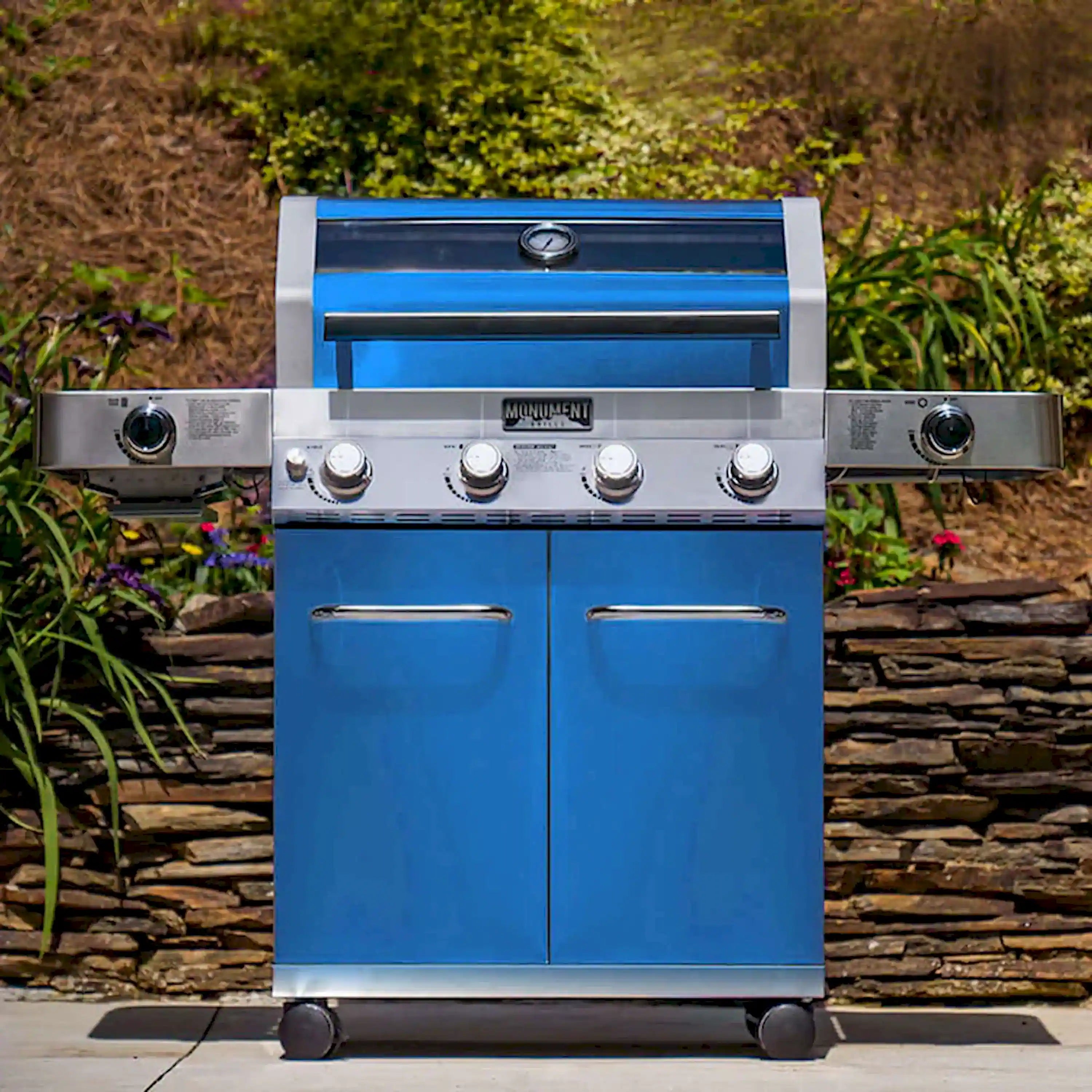 Blue infrared propane gas grill with control knobs and two doors