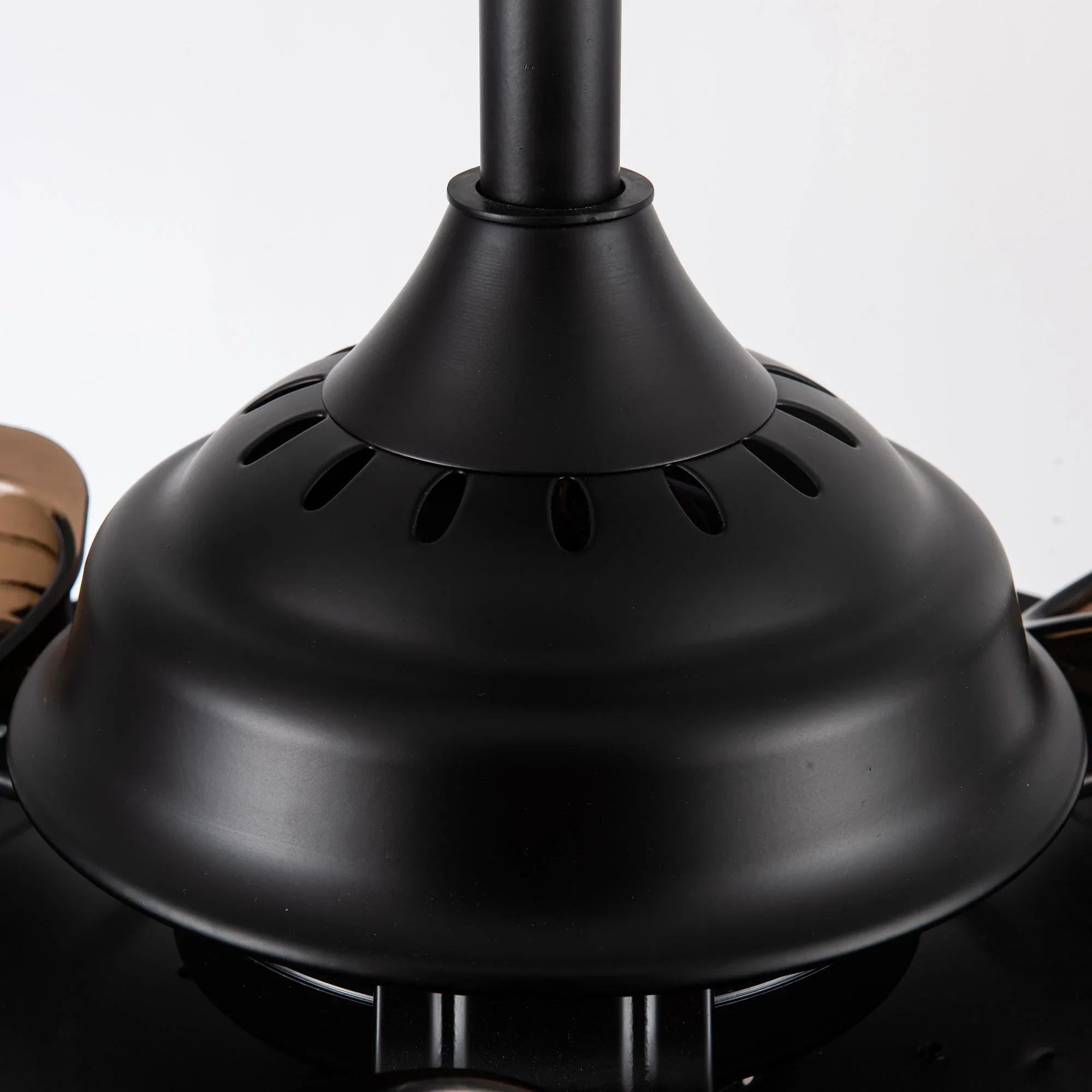 Black ceiling fan downrod mount with decorative curved housing and blade openings