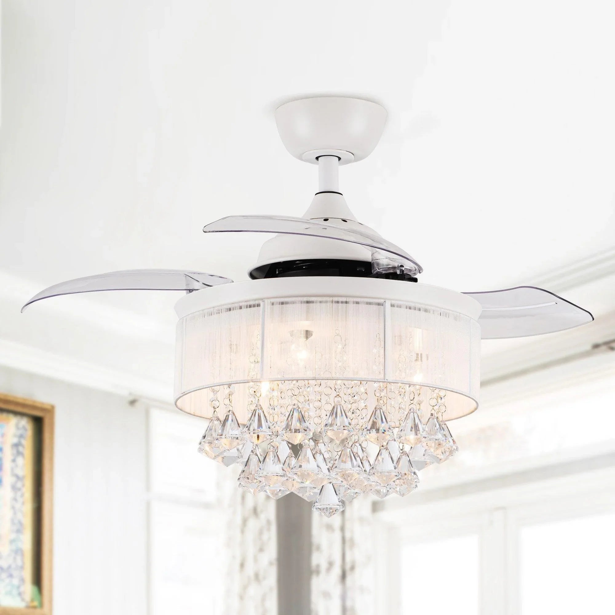 White ceiling fan with crystal light shade and chandelier-style hanging prisms