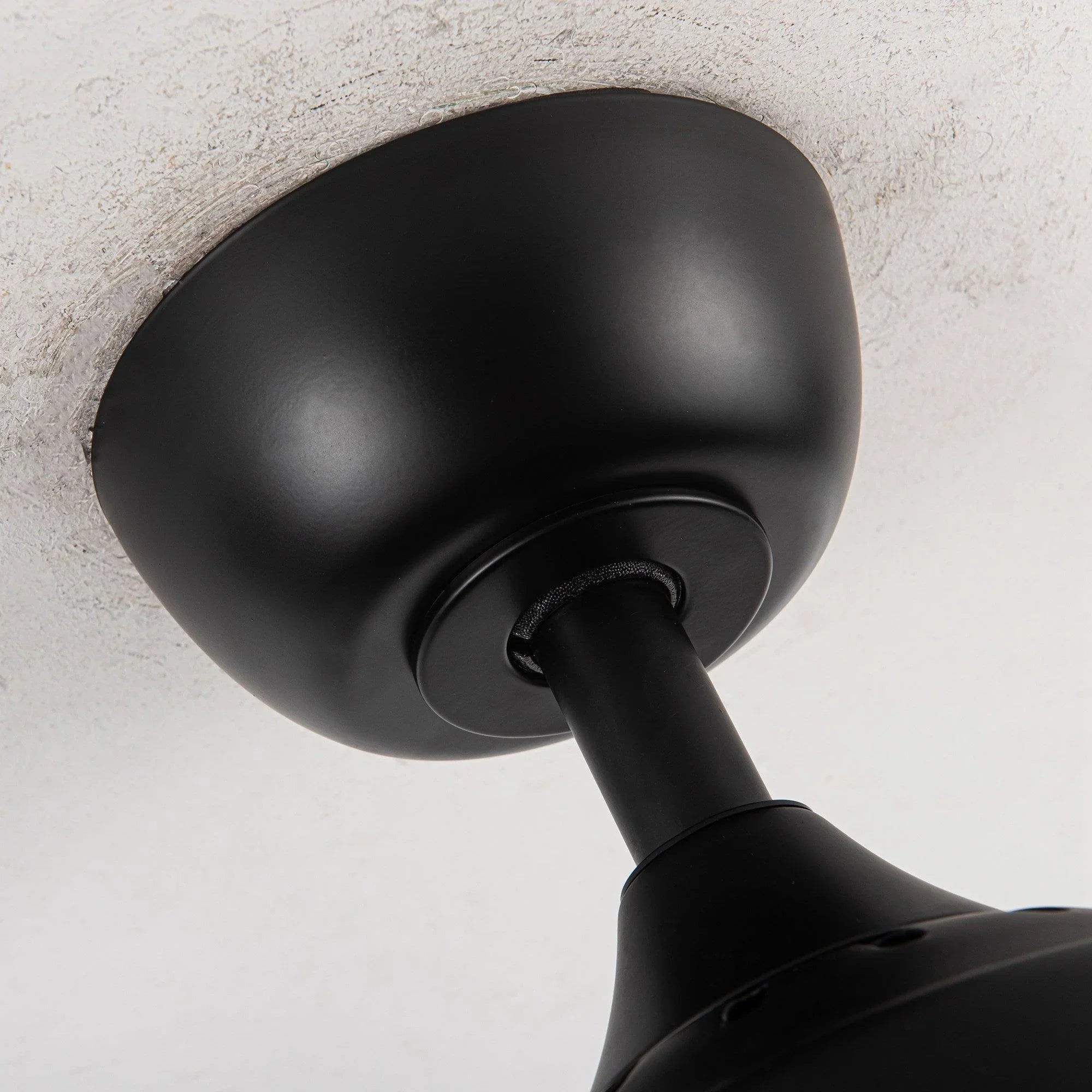 Matte black ceiling fan downrod mount with round ceiling canopy