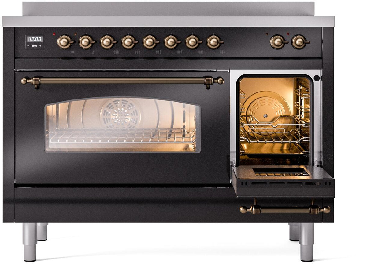 Glossy black range with oven window and right compartment open, showing interior racks
