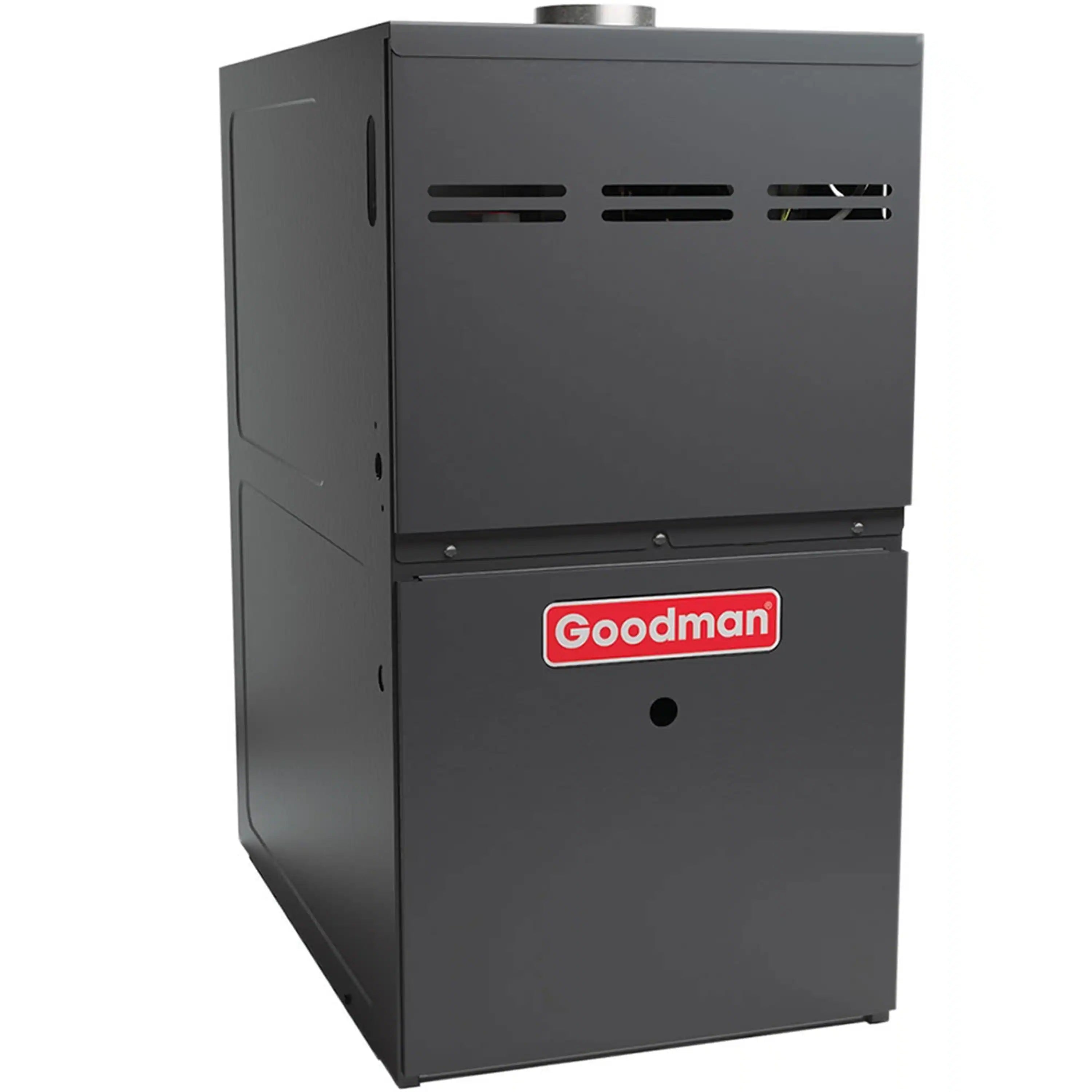 Goodman dark gray gas furnace with side panels, louvered vents, and front control door.