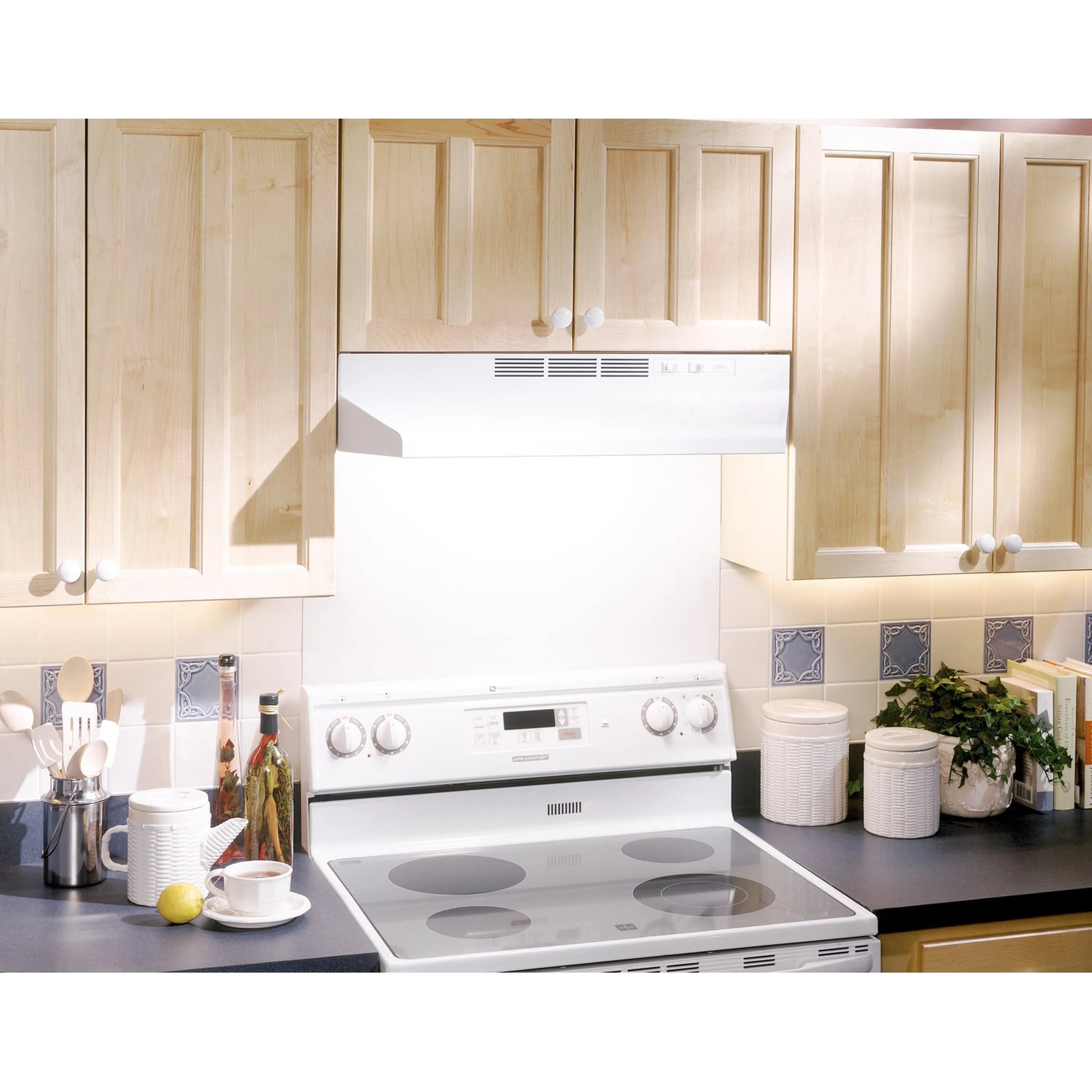White ductless under-cabinet range hood installed above electric cooktop