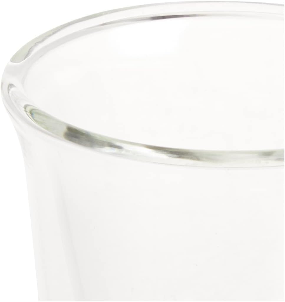 Close-up of clear espresso glass rim and curved side