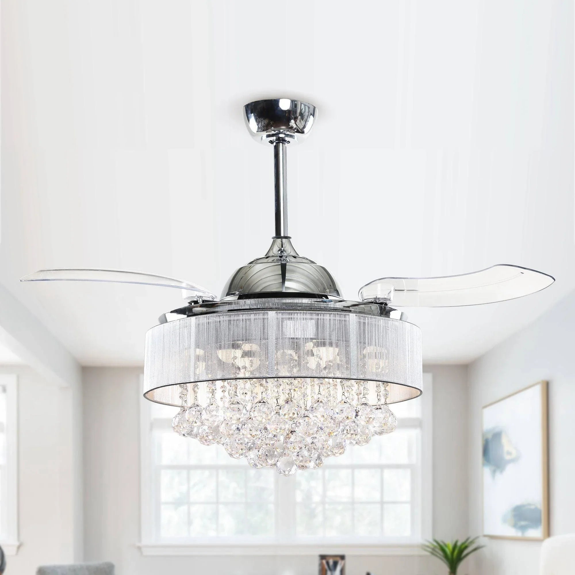 Chrome ceiling fan with clear crystal-style LED light shade and transparent blades