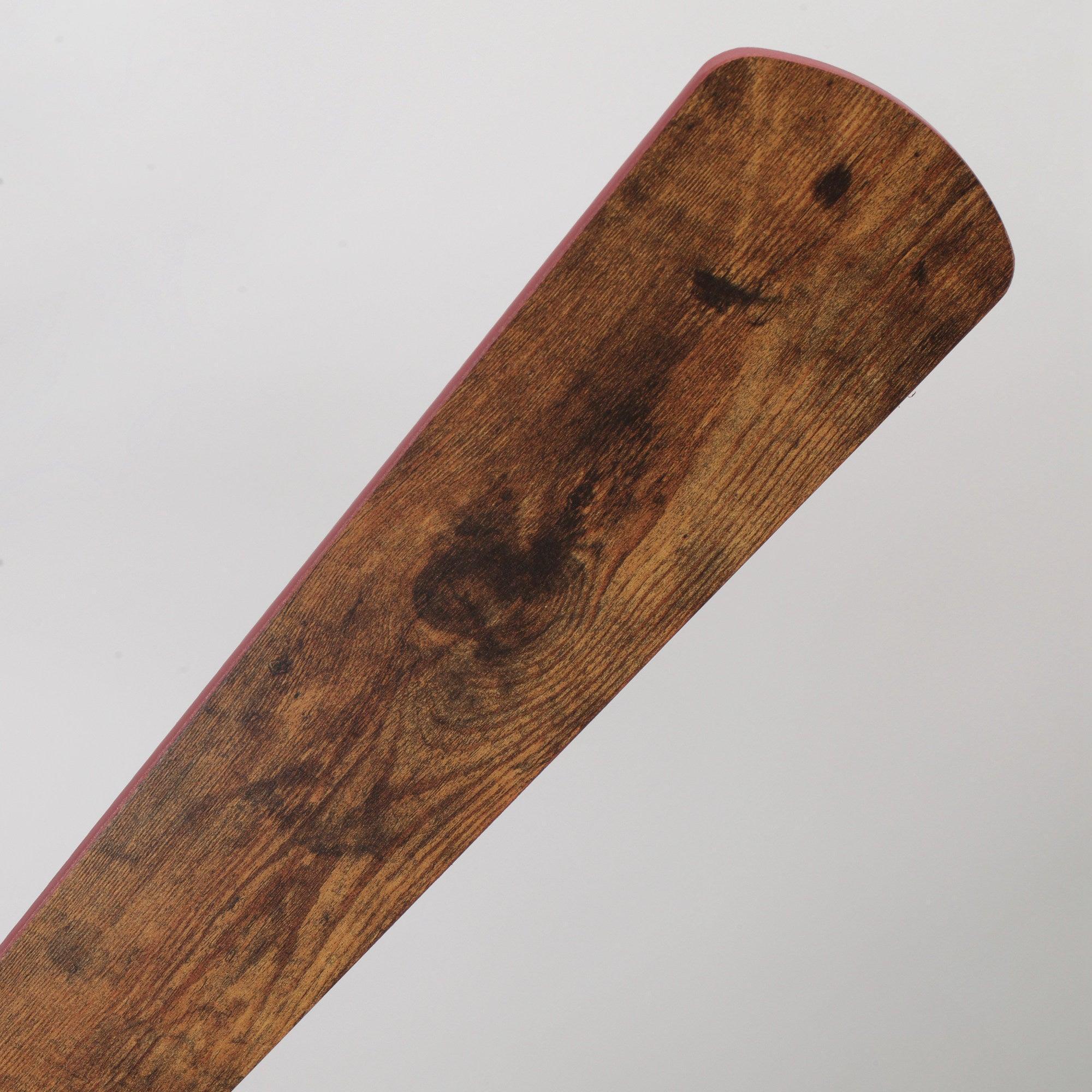 Rustic wooden ceiling fan blade with visible grain and two mounting holes