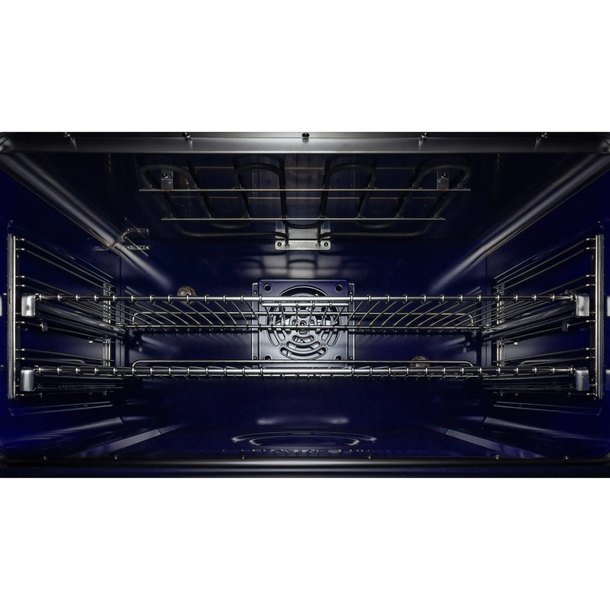 Dual fuel range oven interior with upper broil elements and wire racks
