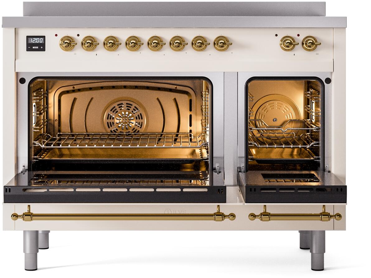 Freestanding electric induction range with antique white doors, brass trim, double oven windows