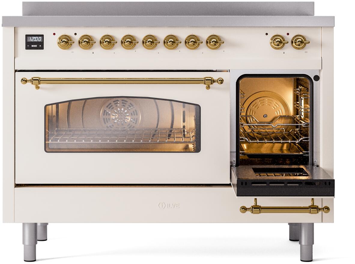 Freestanding electric induction range with antique white finish, left oven open, brass handles