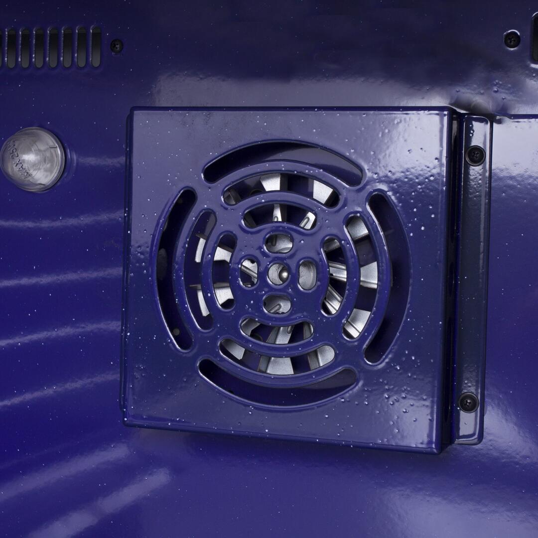 Oven rear blower vent with circular fan grille on blue interior