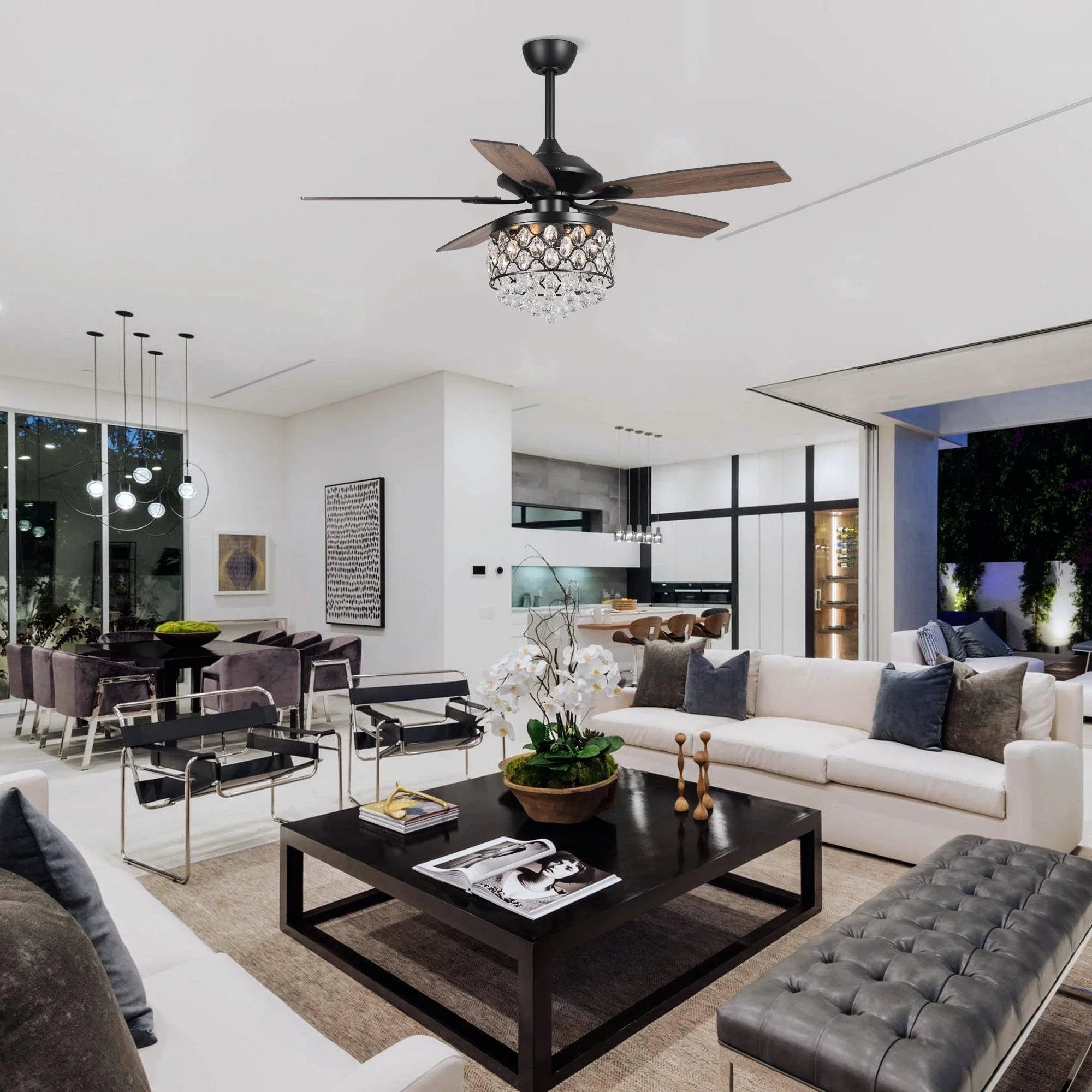 Black ceiling fan with crystal light fixture and medium wood-look blades