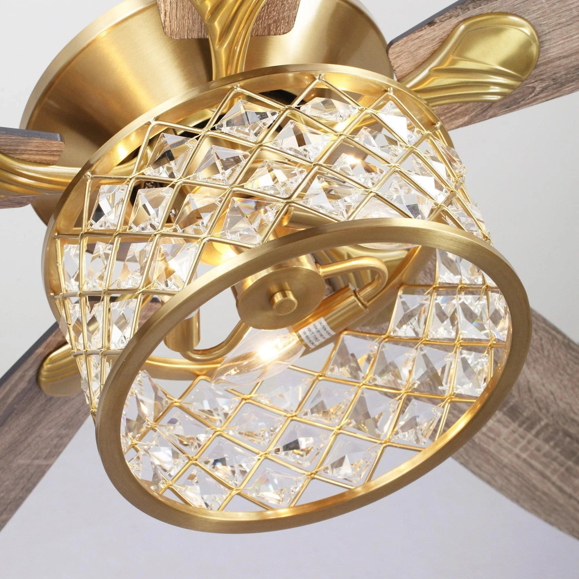 Golden ceiling fan light kit with crystal drum and gold lattice cage