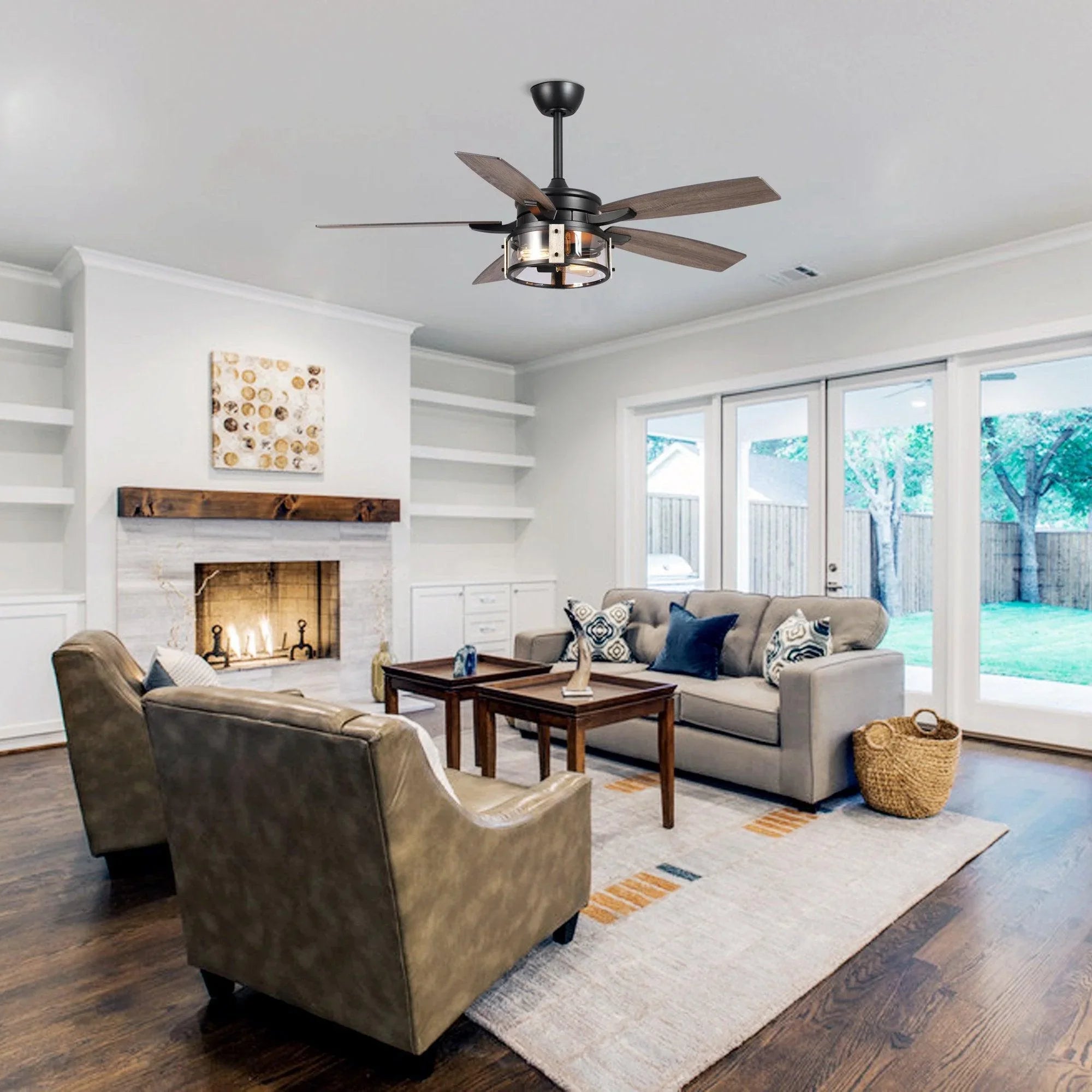Black ceiling fan with wood-look blades and lit light fixture in living room