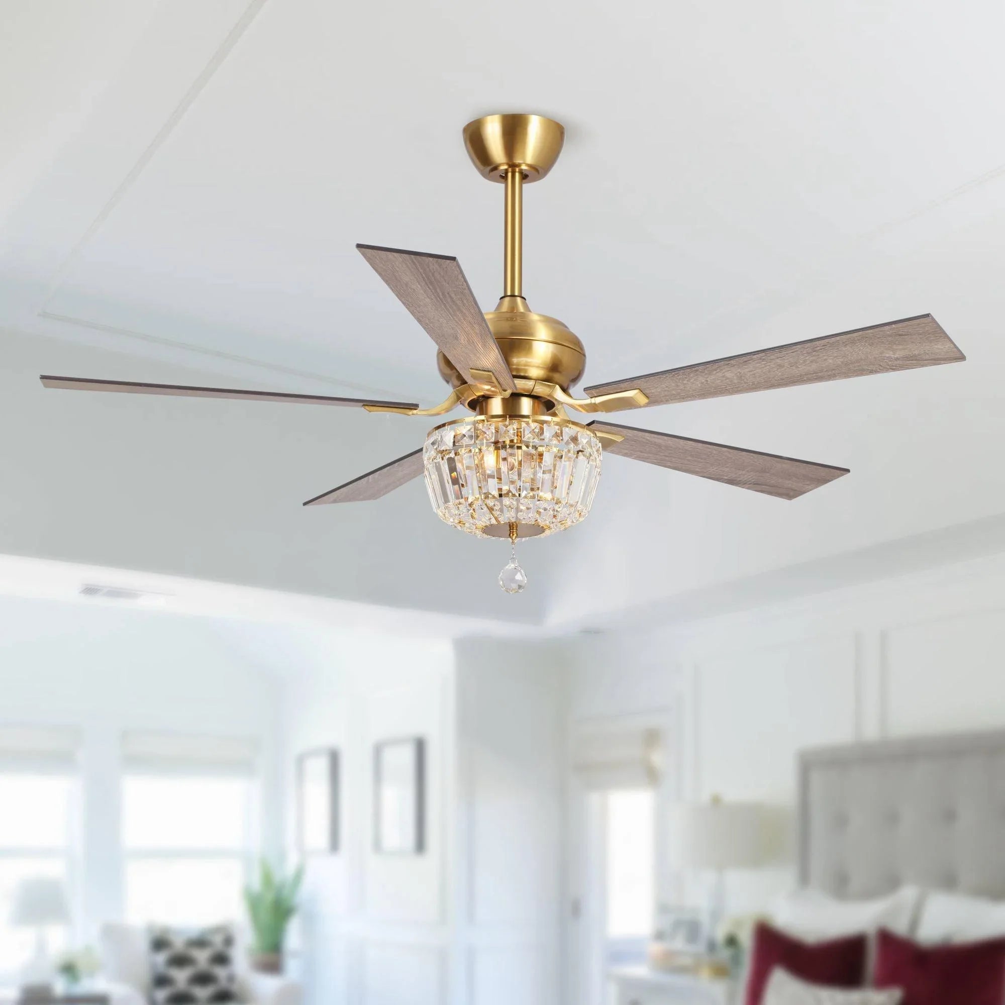 Gold 52-inch ceiling fan with crystal light centerpiece and five blades